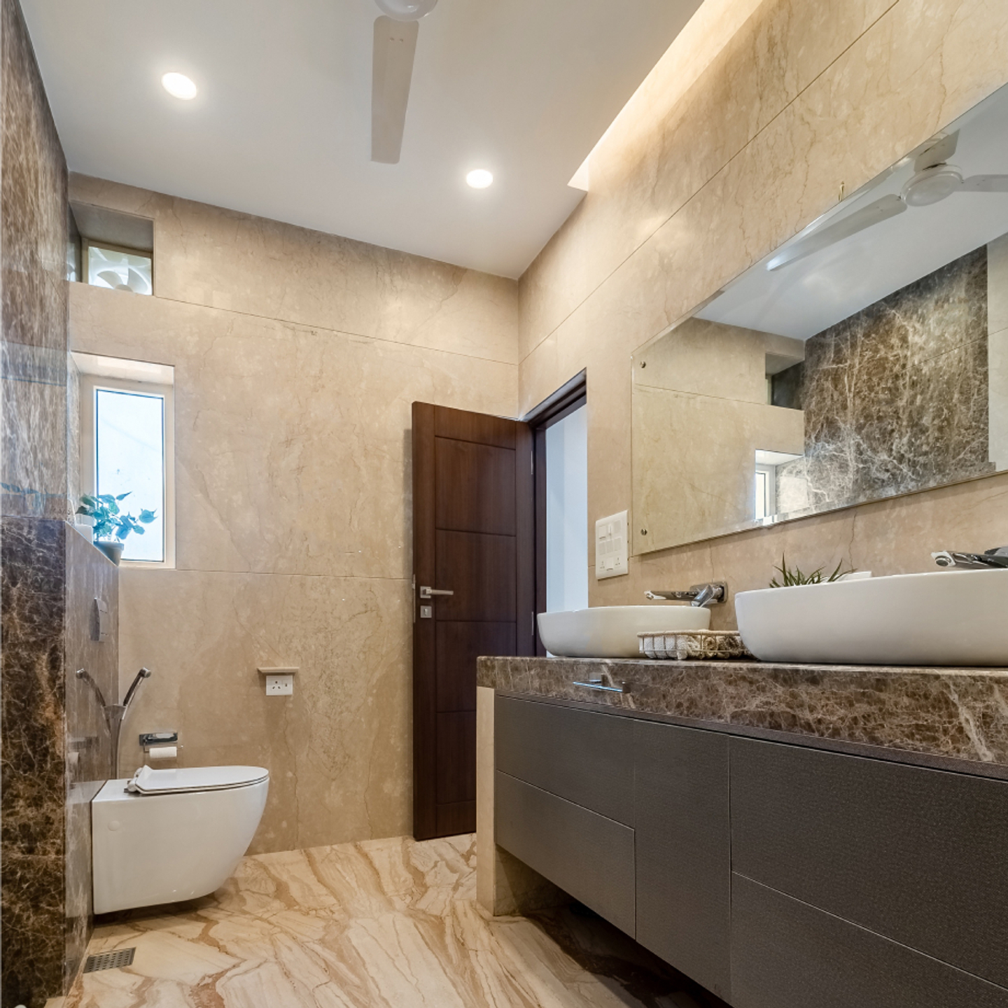 Beige Marble Wall Tiles Design For Bathrooms | Livspace