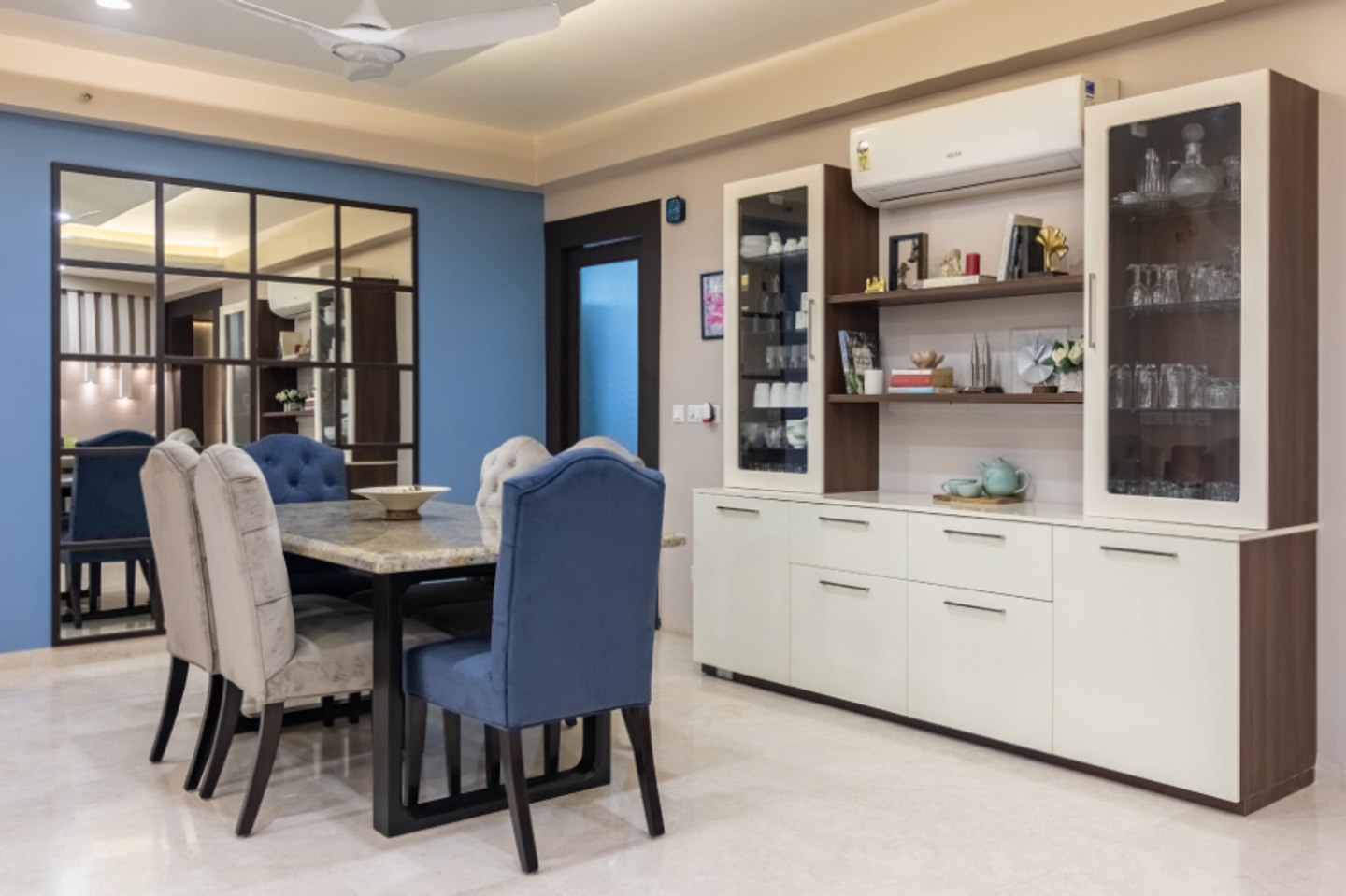 Contemporary Blue And Grey Dining Room Design With White Crockery Unit