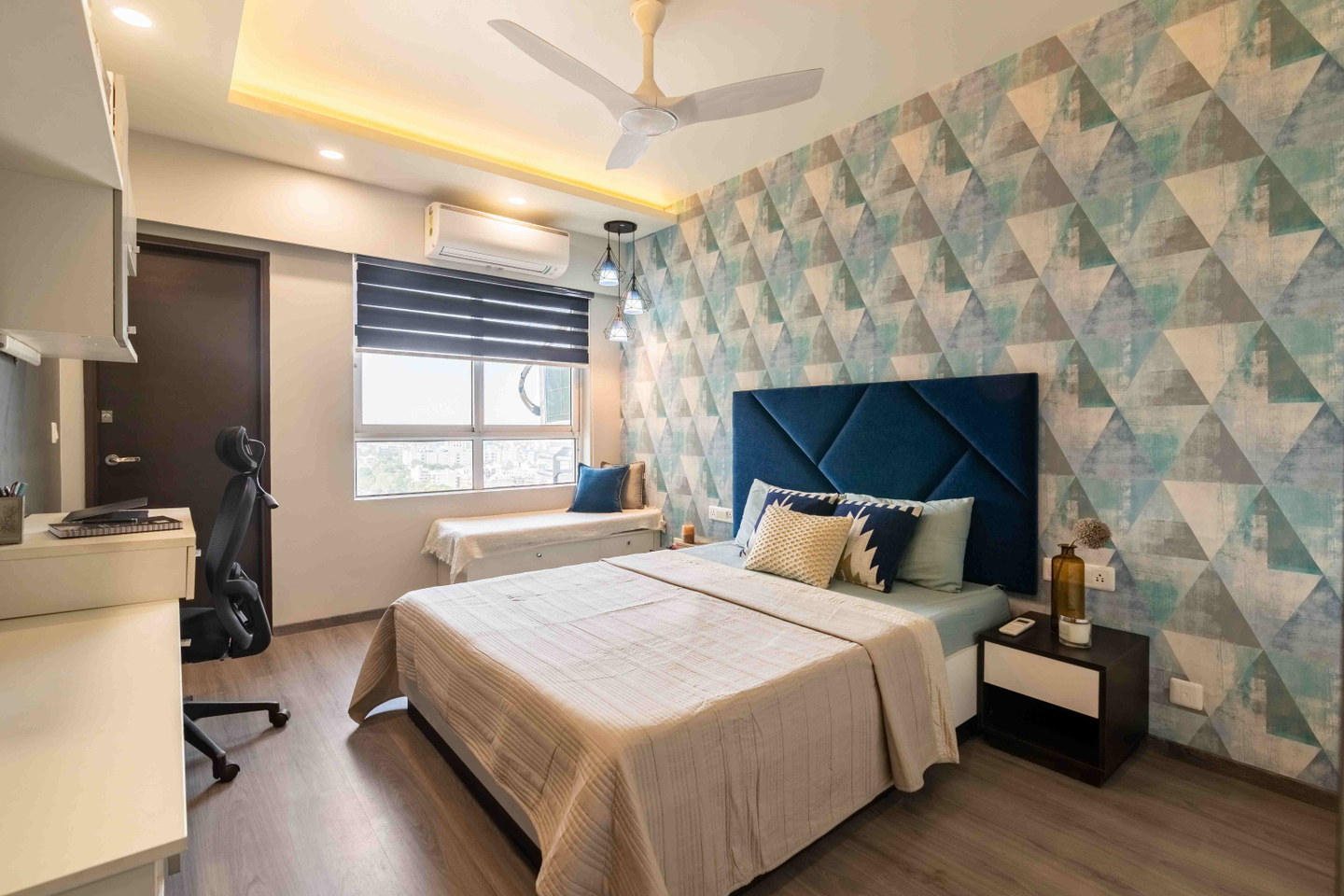 Bedroom Design With A White Bed With Blue Velvet Headboard - Livspace