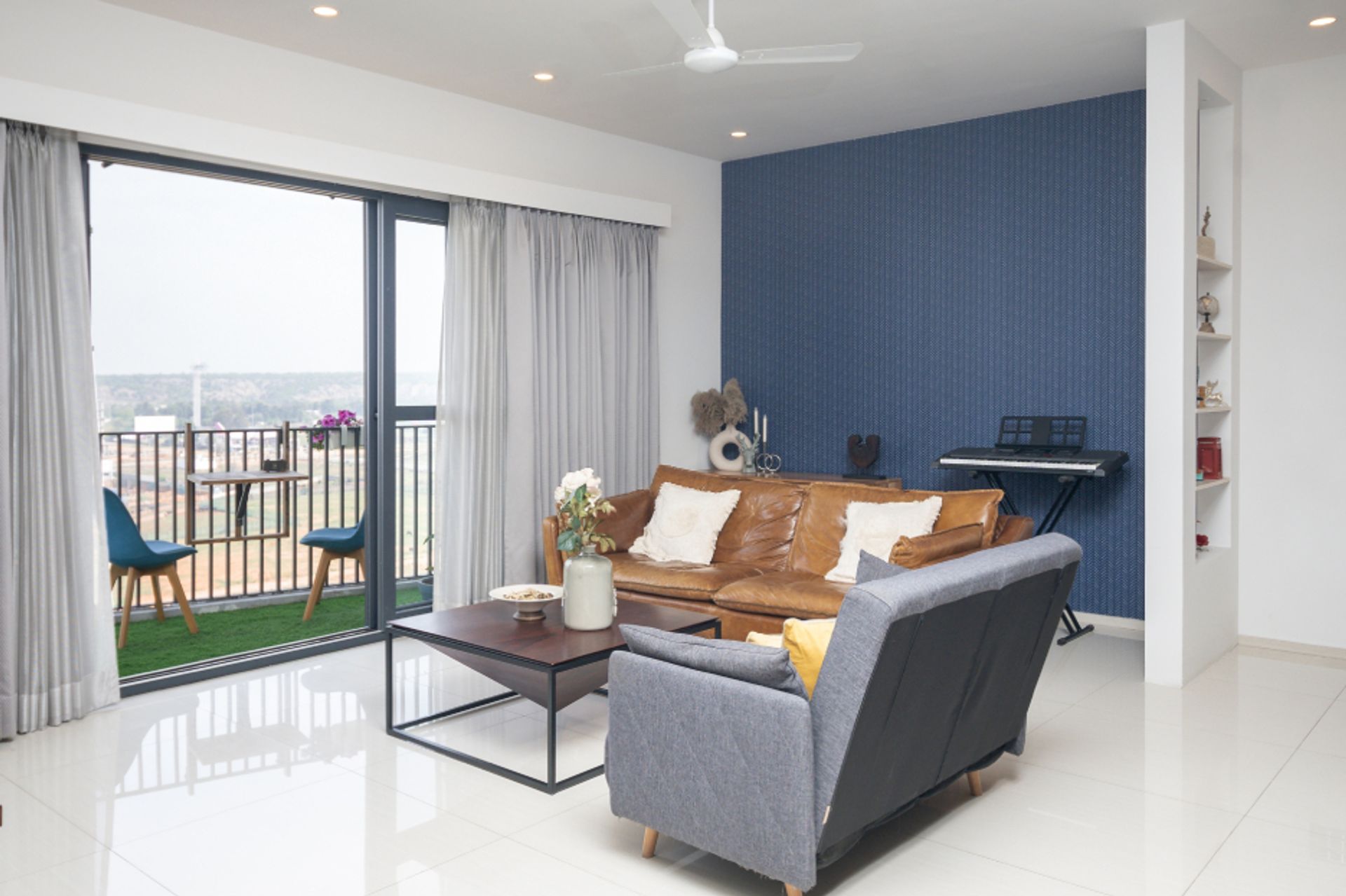 Compact Living Room Tile Design With 2’ x 2’ Vitrified Tiles | Livspace