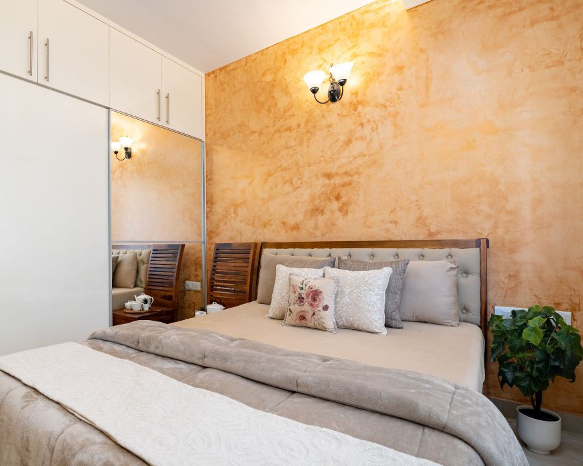 Textured Wall Paint Design With Sconces | Livspace - Textured Accent Wall Paint Ideas For Apartments