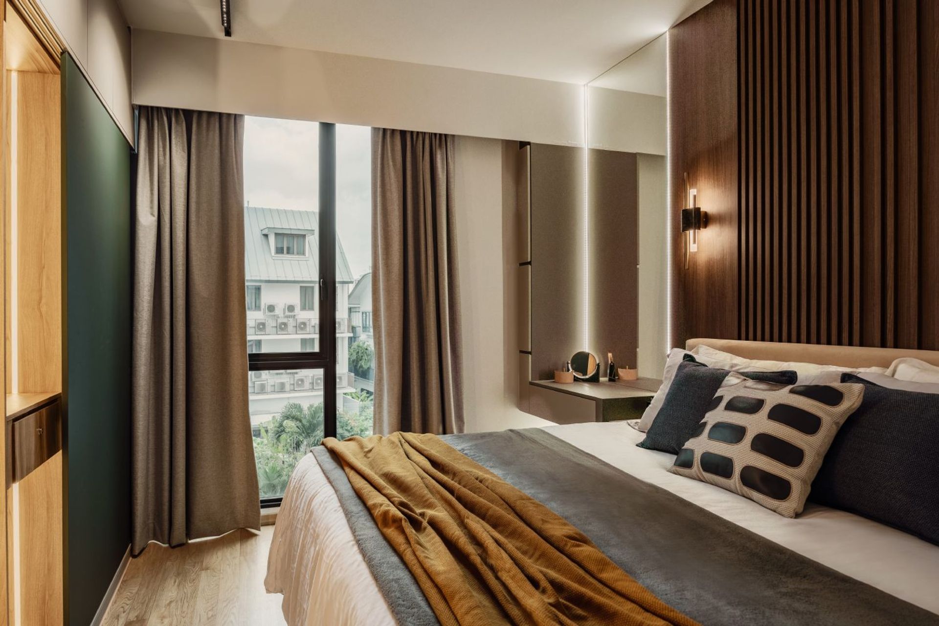 Compact Master Bedroom Design With Wood-Panelled Accent Wall | Livspace