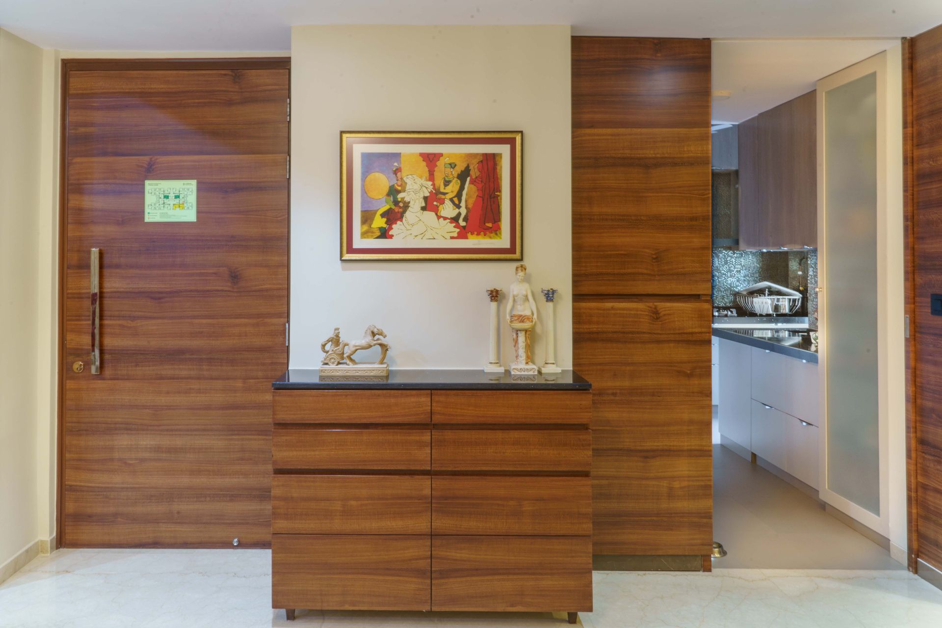 4-BHK Flat In Mumbai With L-Shaped Wooden Bar Unit | Livspace