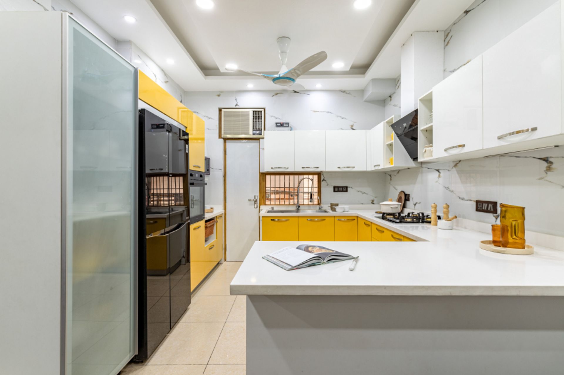 Modular Kitchen Design With White Marble Dado Tiles | Livspace
