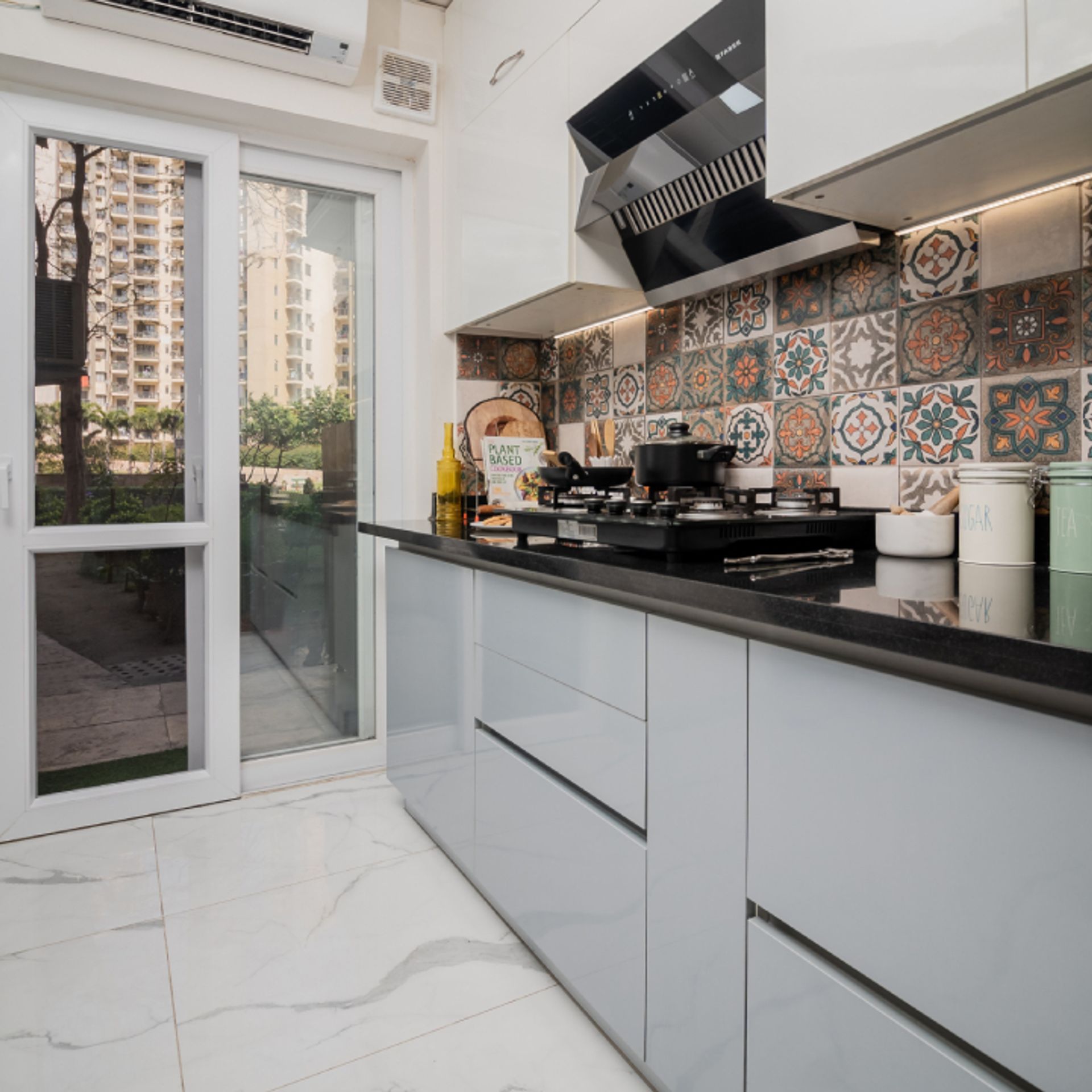 Compact Kitchen Design With Grey And White Storage Units | Livspace