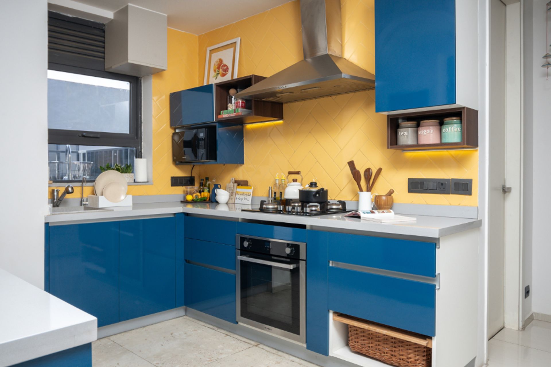 Compact Kitchen Design With Glossy Blue Storage Units | Livspace