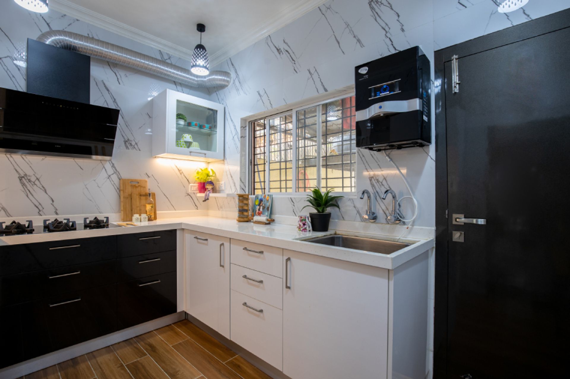 U-Shaped Kitchen Design With Black And White Storage Cabinets | Livspace
