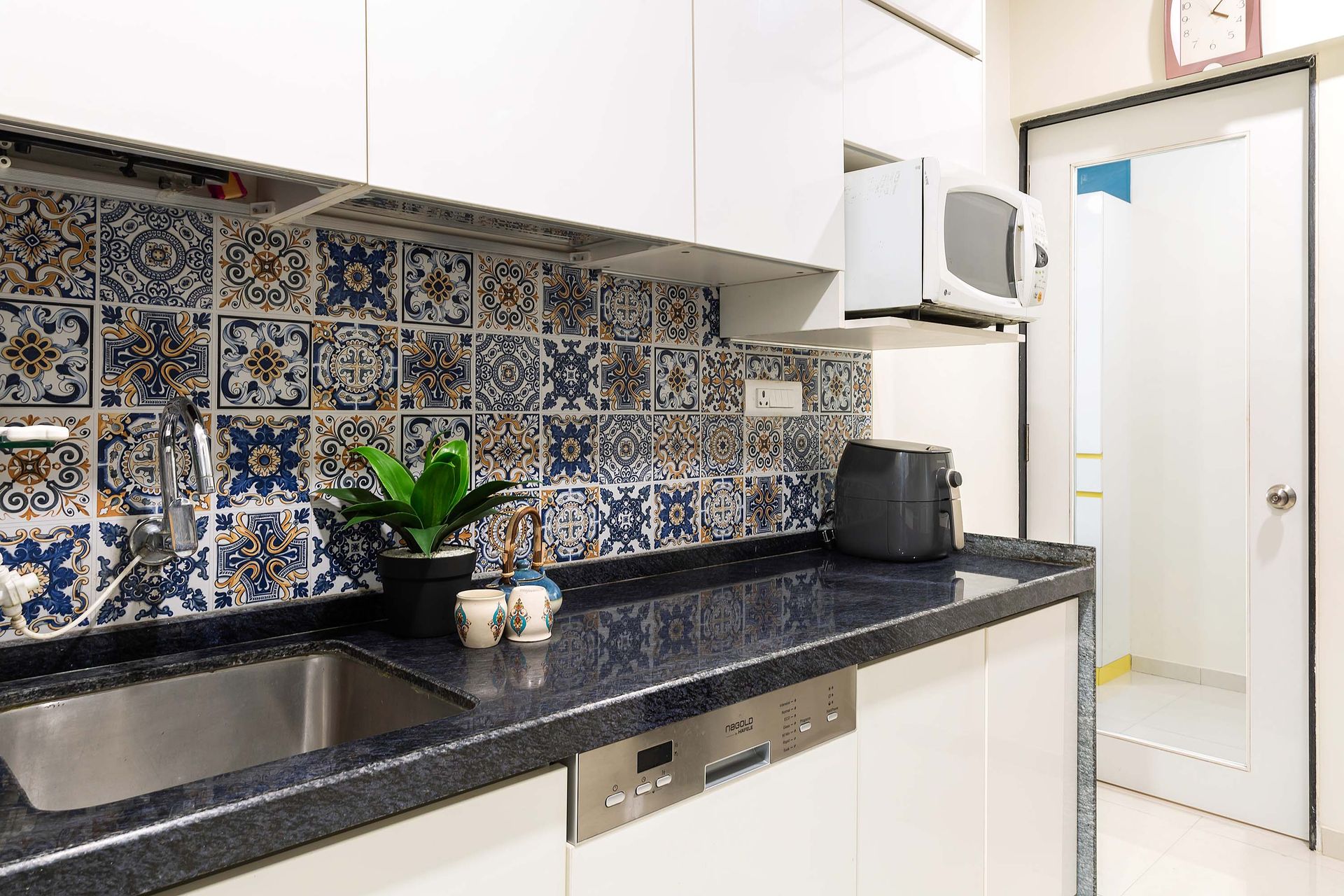 Modular Parallel Kitchen Design With Moroccan Dado Tiles | Livspace