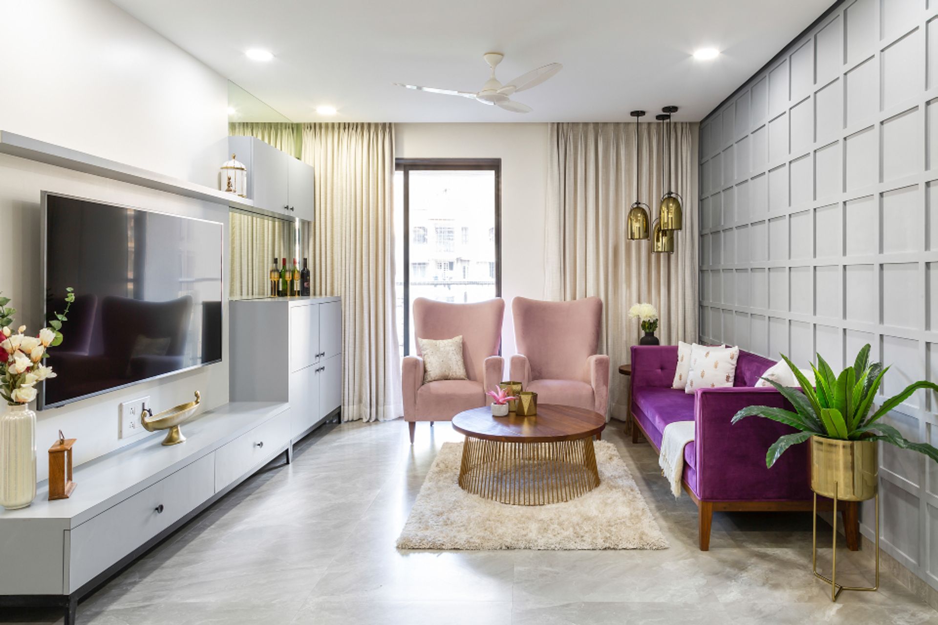 Living Room Interior Design With A Comfortable Sofa And Armchair | Livspace