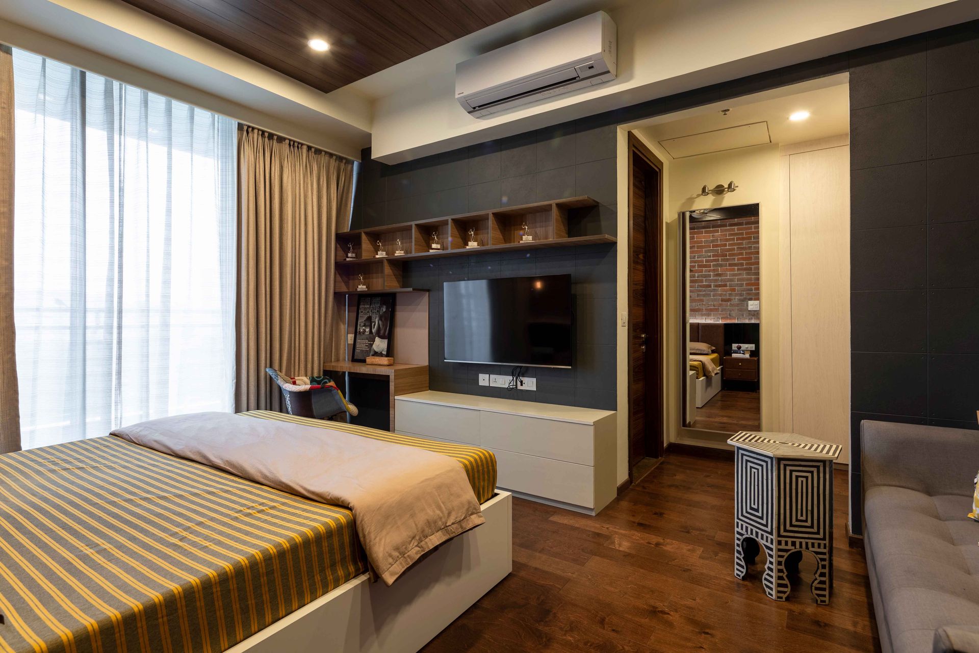 Contemporary Master Bedroom Design with Brown Headboard | Livspace