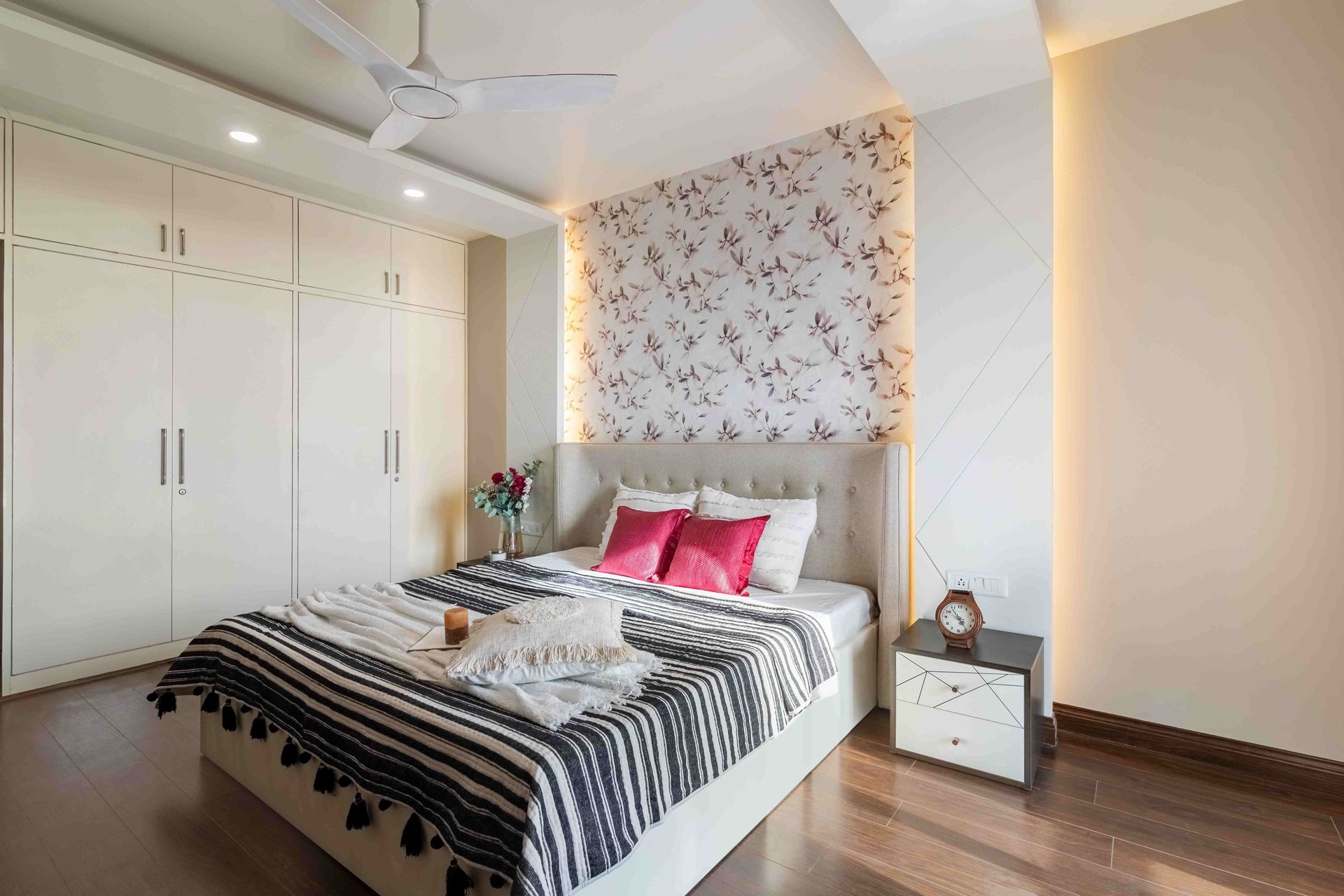 Spacious Bedroom Design With LED Strips And Spotlights | Livspace