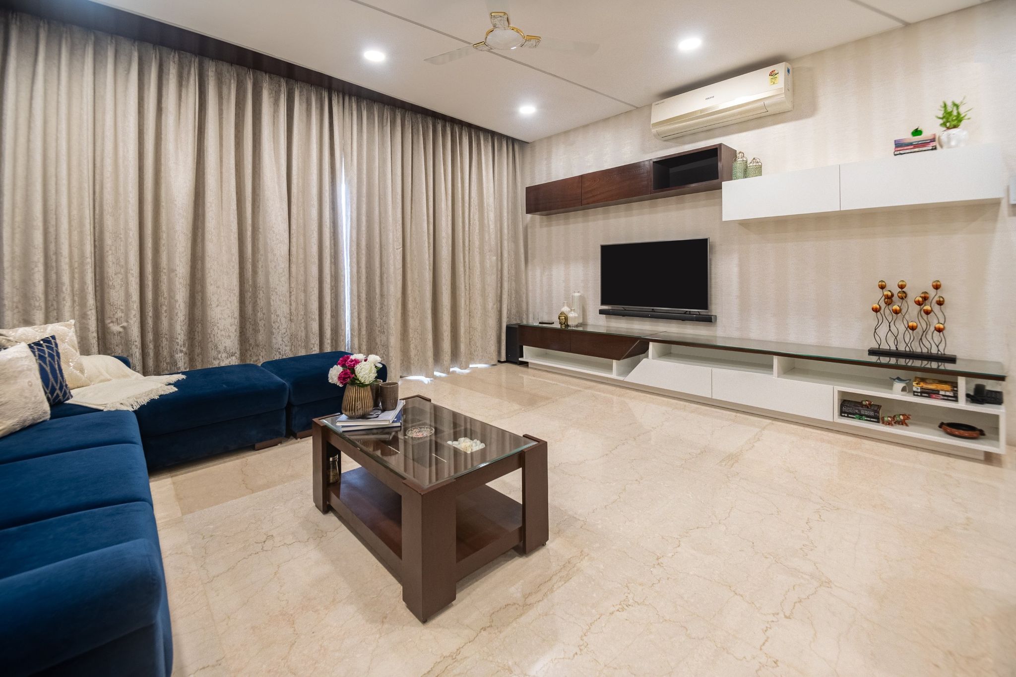 Compact Living Room Tile Design 2’ x 4’ Marble Tiles | Livspace