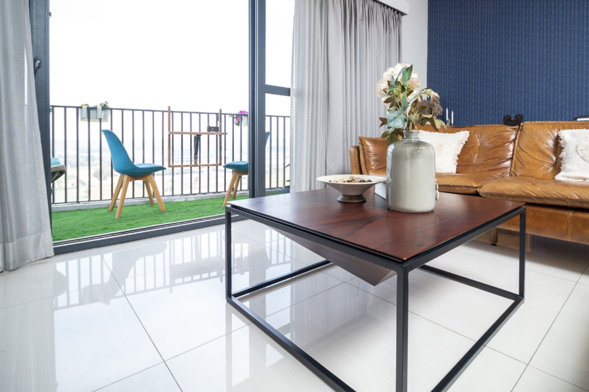 Compact Living Room Tile Design With 2’ x 2’ Vitrified Tiles | Livspace