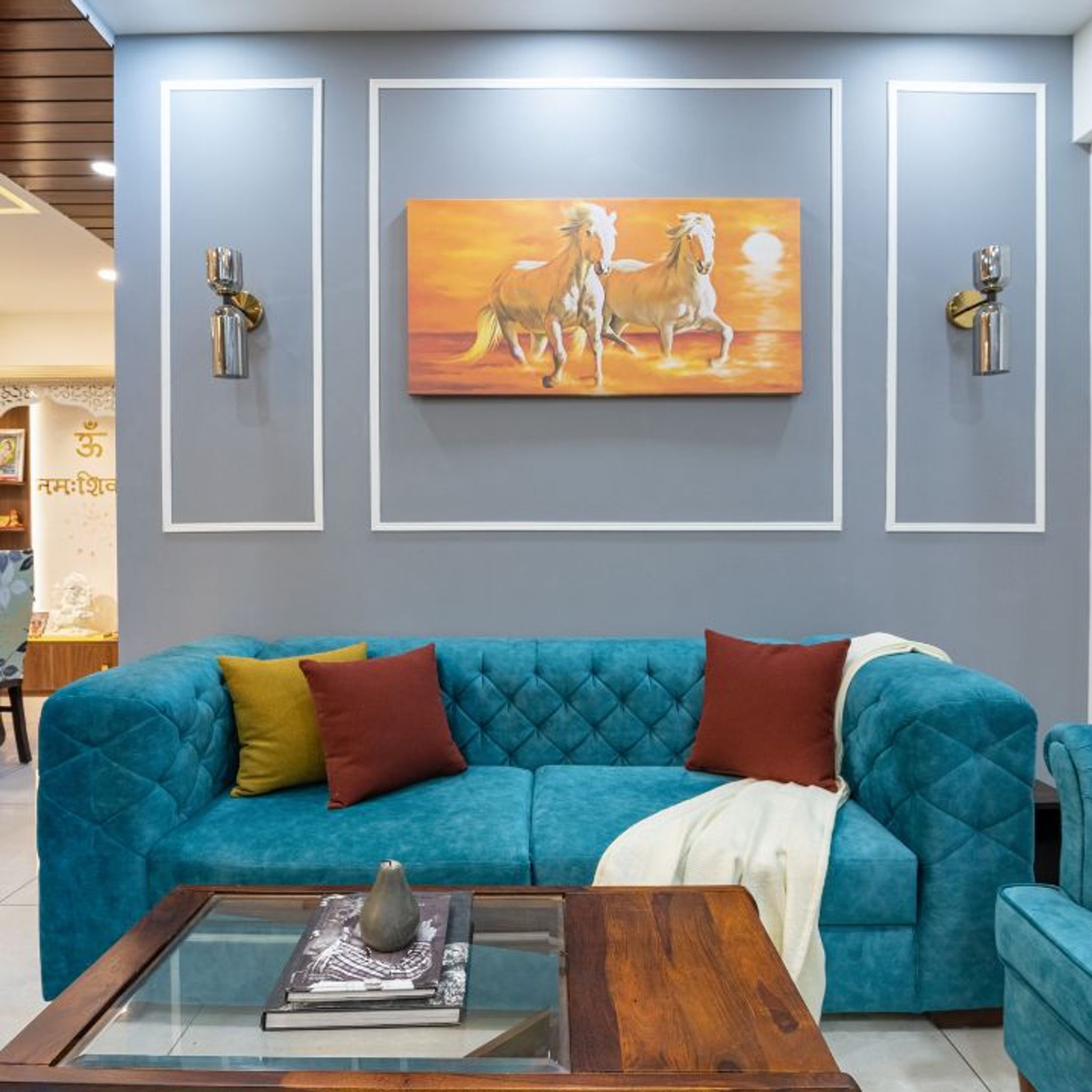 White And Blue Living Room Wall Paint With Wall Trims | Livspace