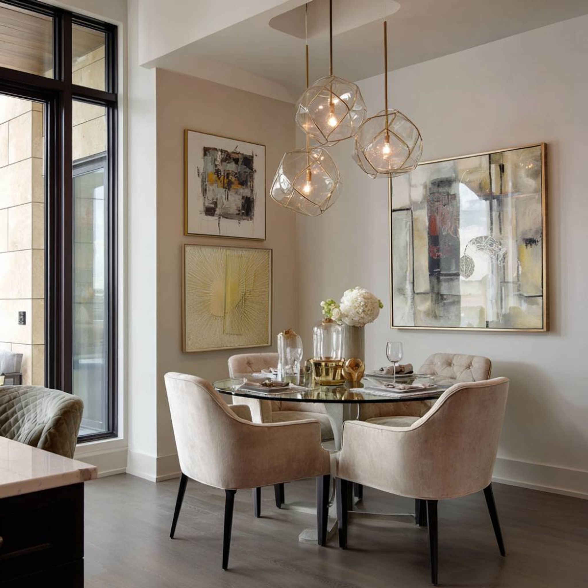 Dining Room Design with Contemporary Plush Seating and Round Glass