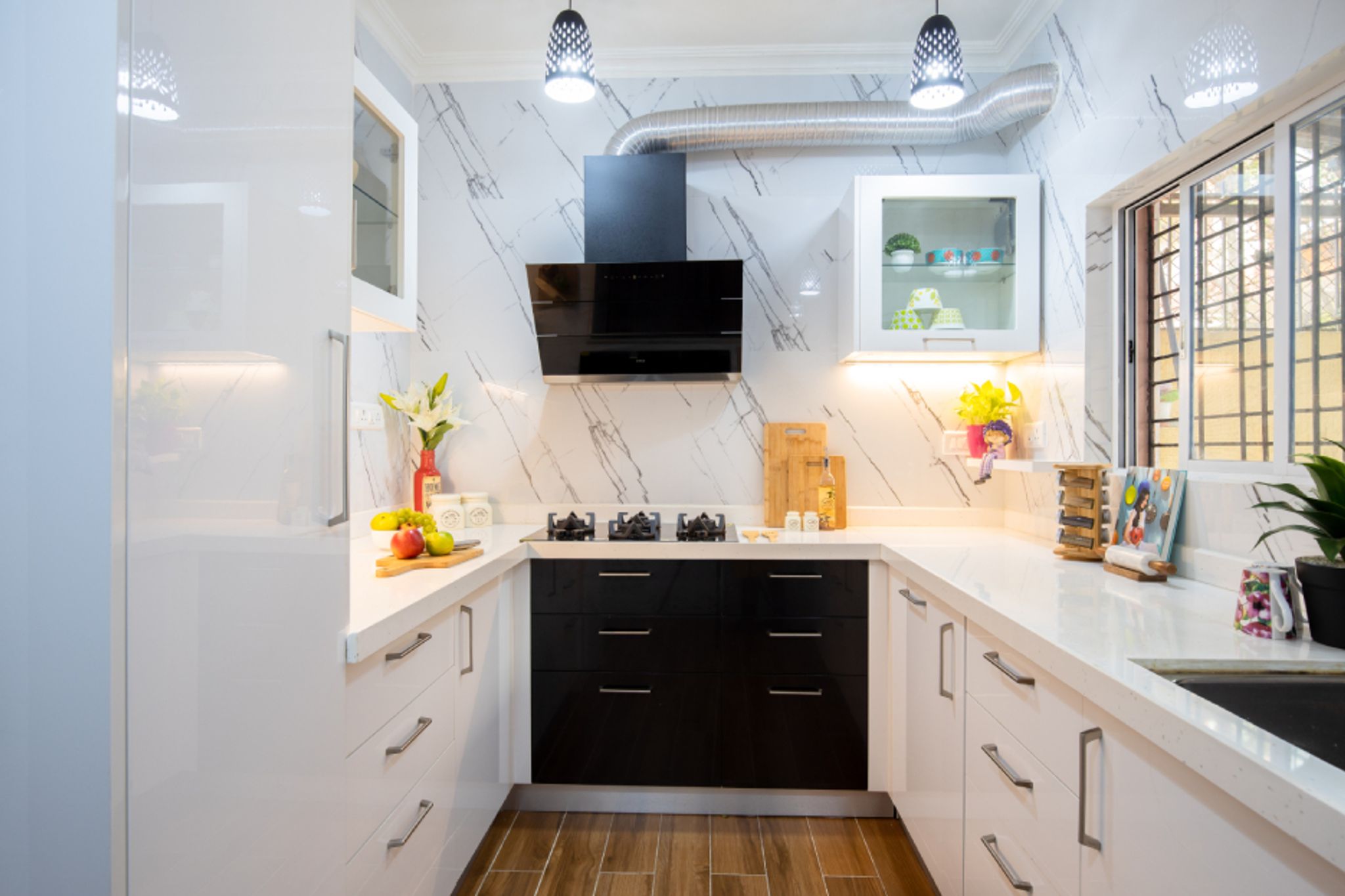 U-Shaped Kitchen Design With Black And White Storage Cabinets | Livspace