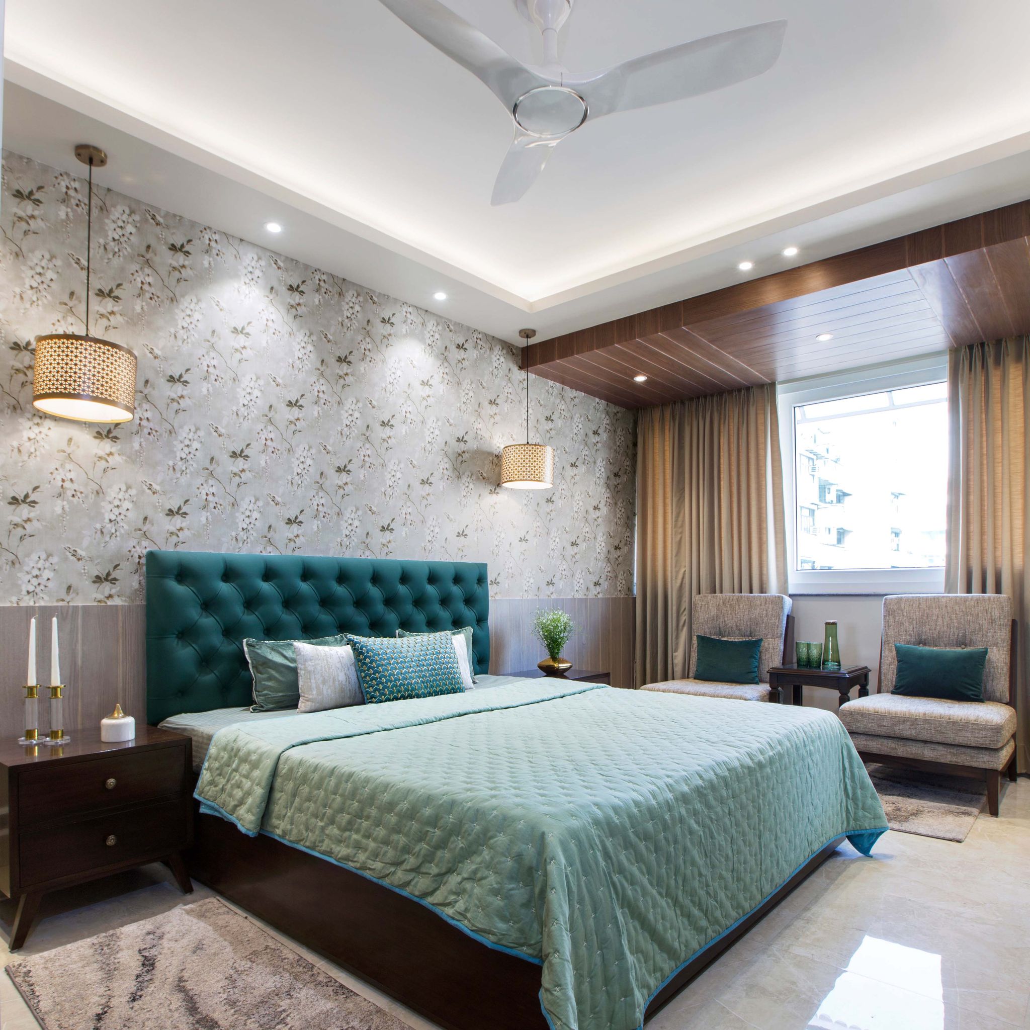 Contemporary Master Bedroom Design with Teal Tufted Headboard | Livspace