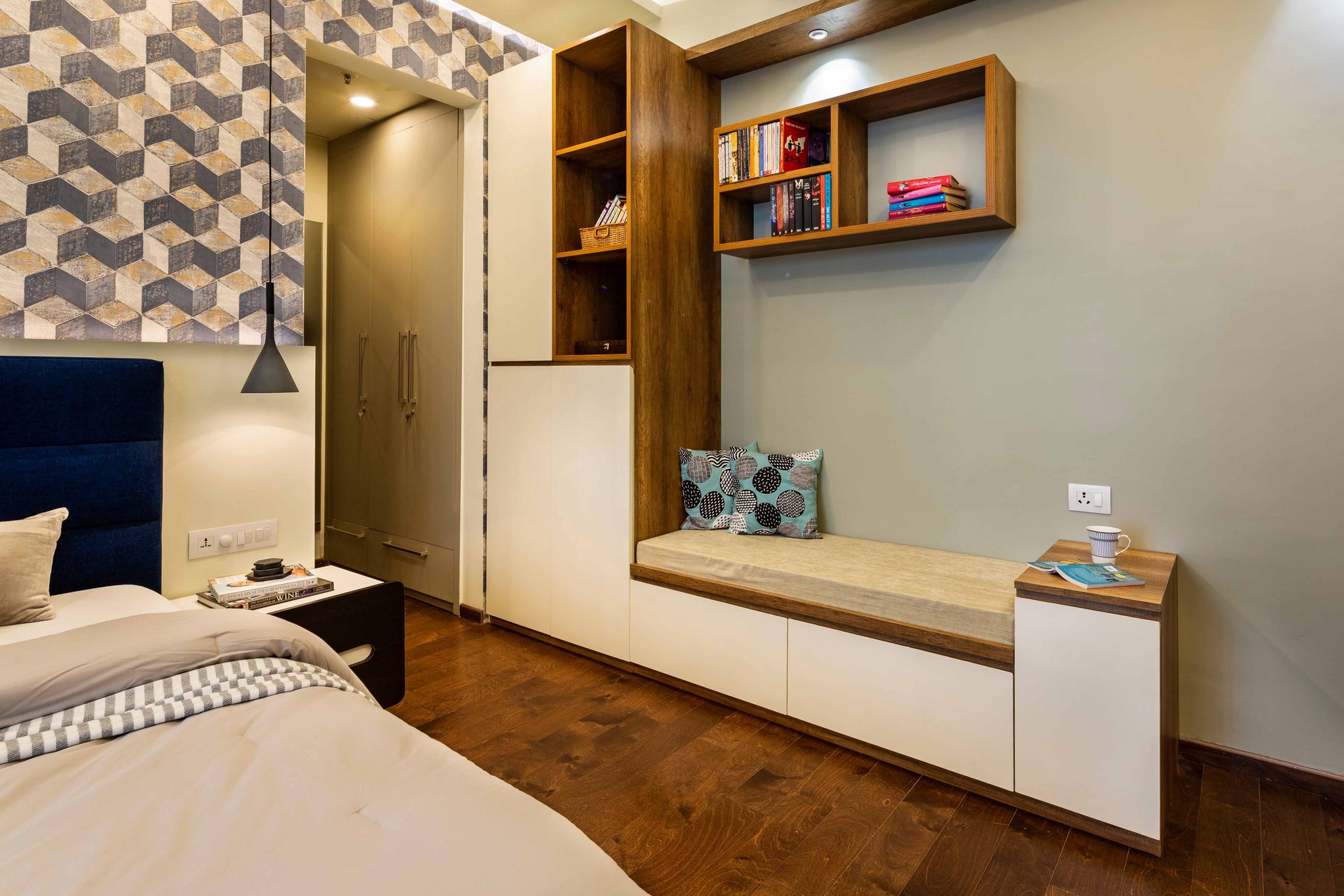Contemporary Master Bedroom Design with Blue Tufted Headboard | Livspace
