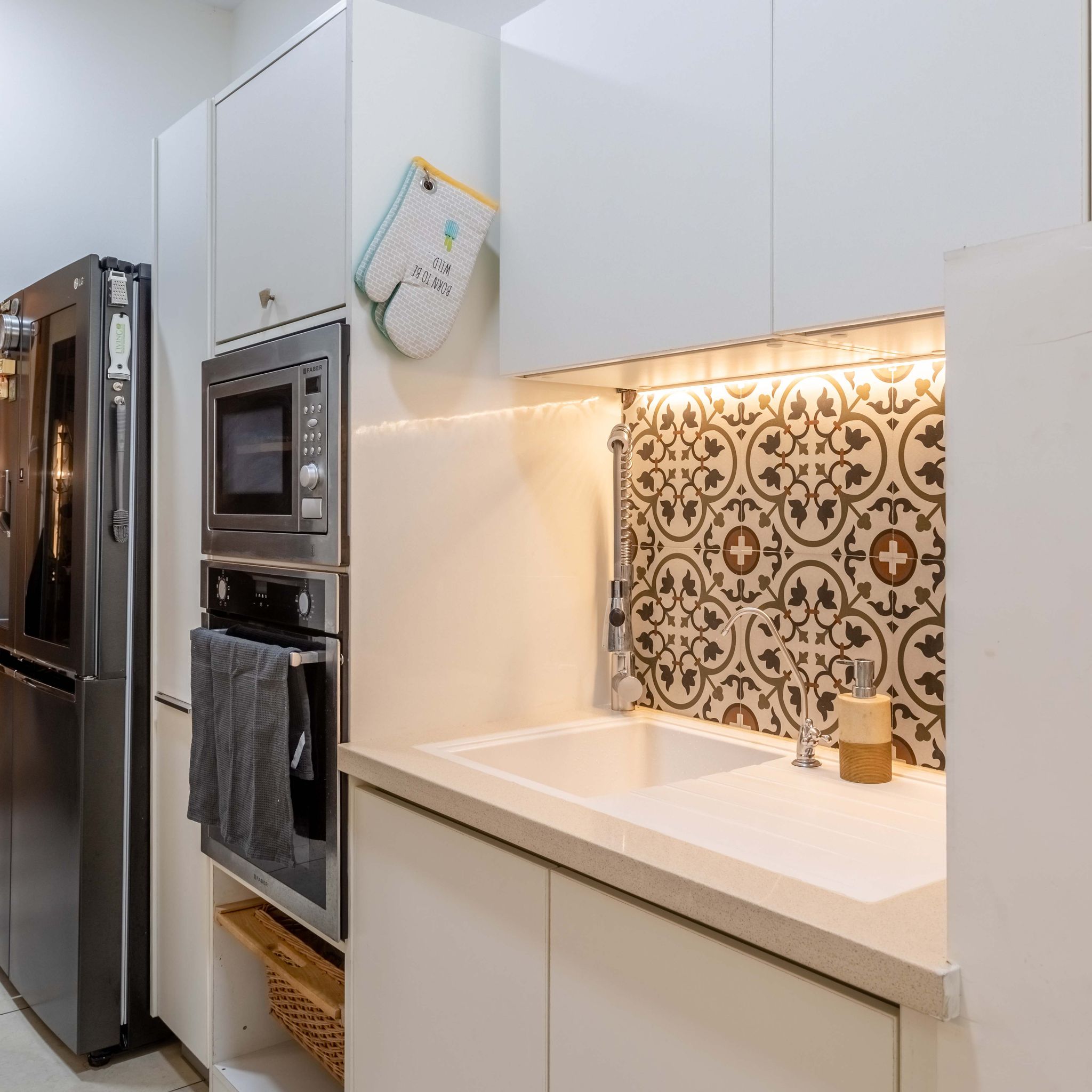 Frosty White Modular Parallel Kitchen Design With Patterned Backsplash ...