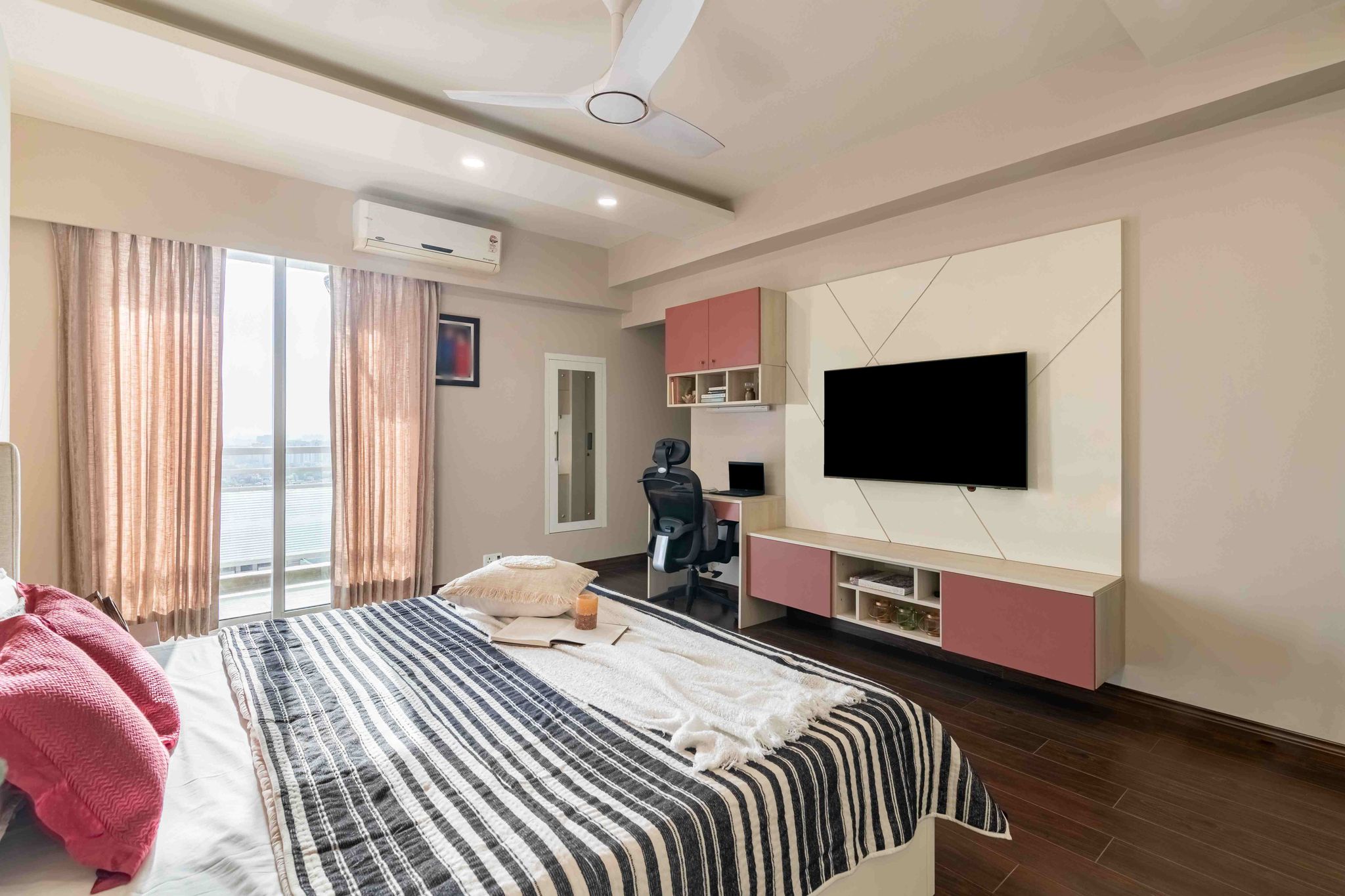 Spacious Bedroom Design With LED Strips And Spotlights | Livspace