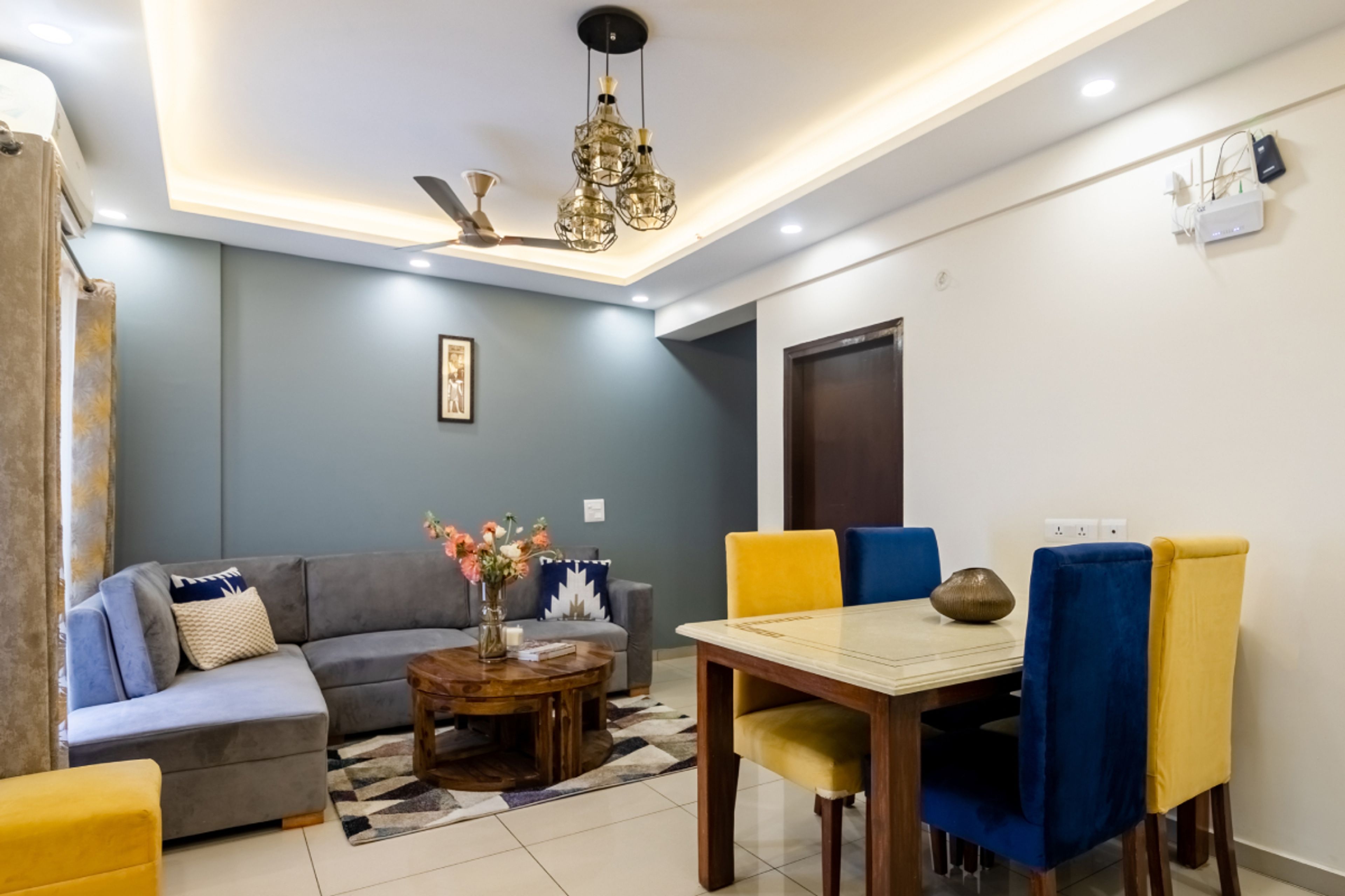Lavish False Ceiling Design With Grey Couch - Livspace
