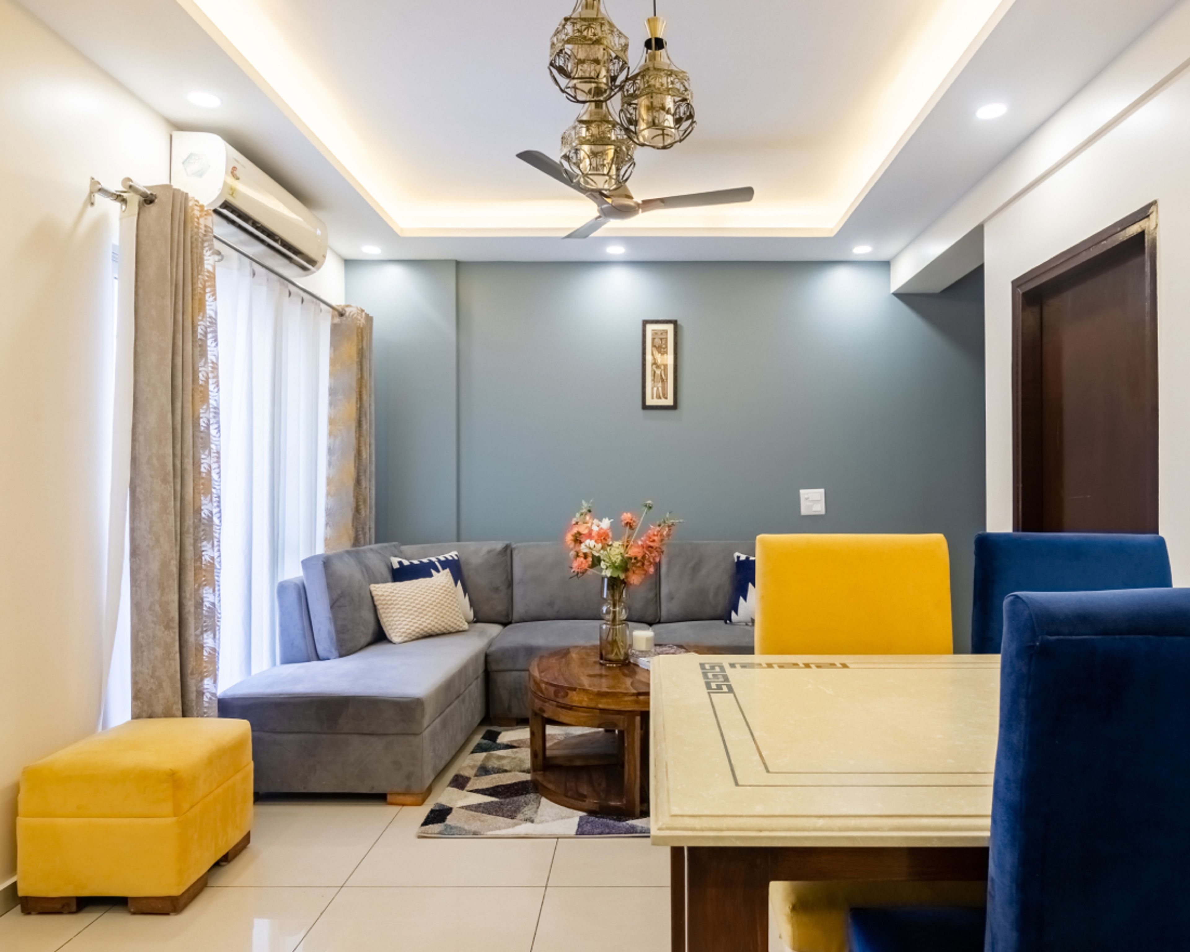 Lavish False Ceiling Design With Grey Couch - Livspace
