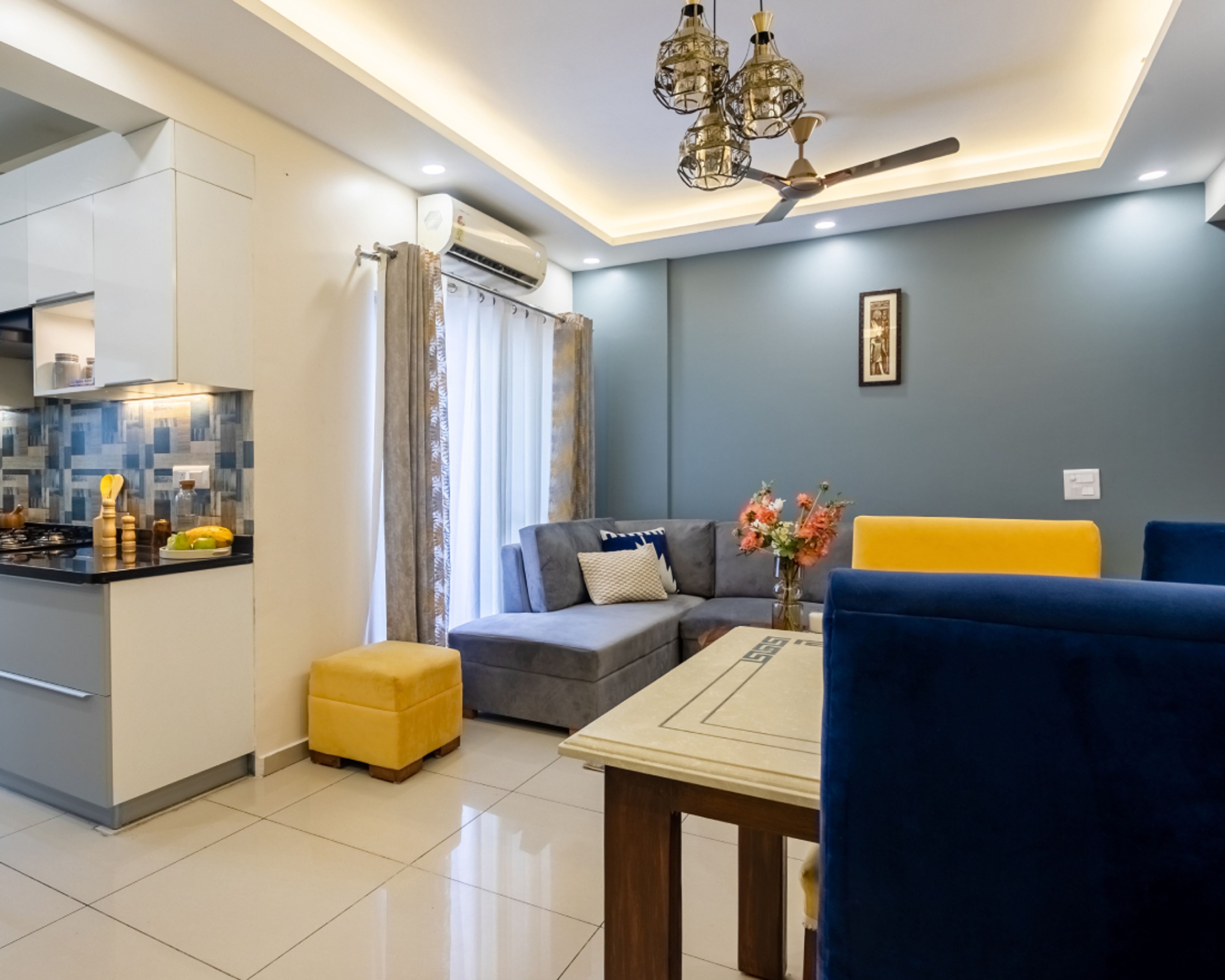 Lavish False Ceiling Design With Grey Couch - Livspace