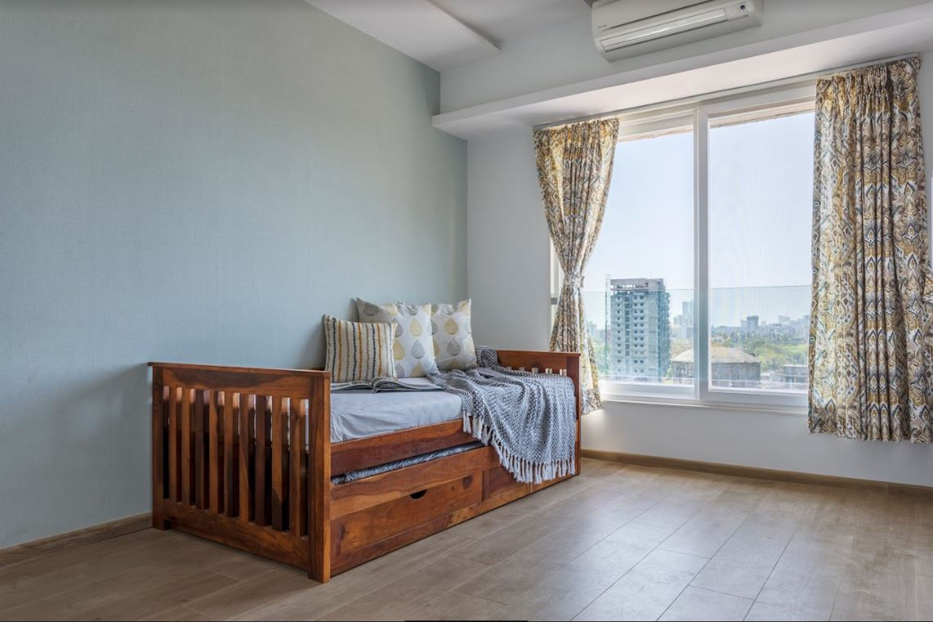 Modern Kids Room Design With Multifunctional Wooden Sofa Cum Bed