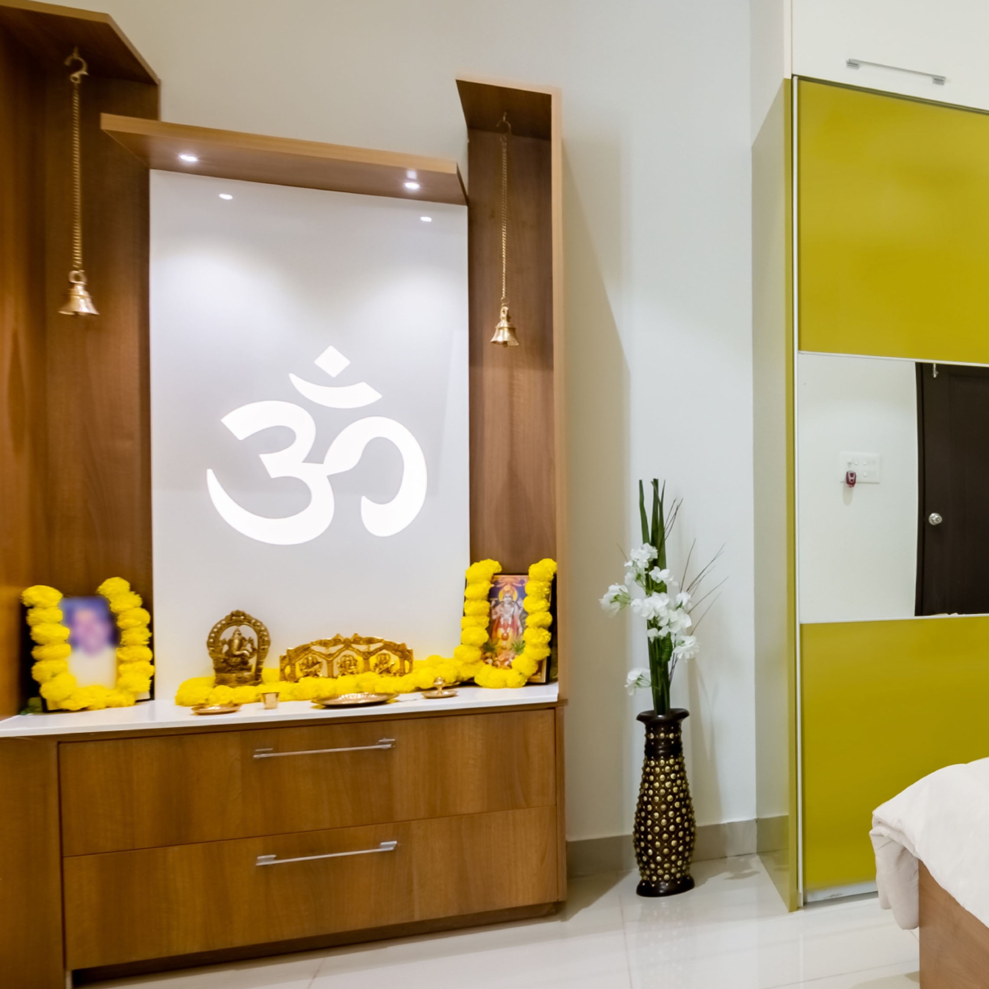 Contemporary Mandir Design With Glossy Backdrop