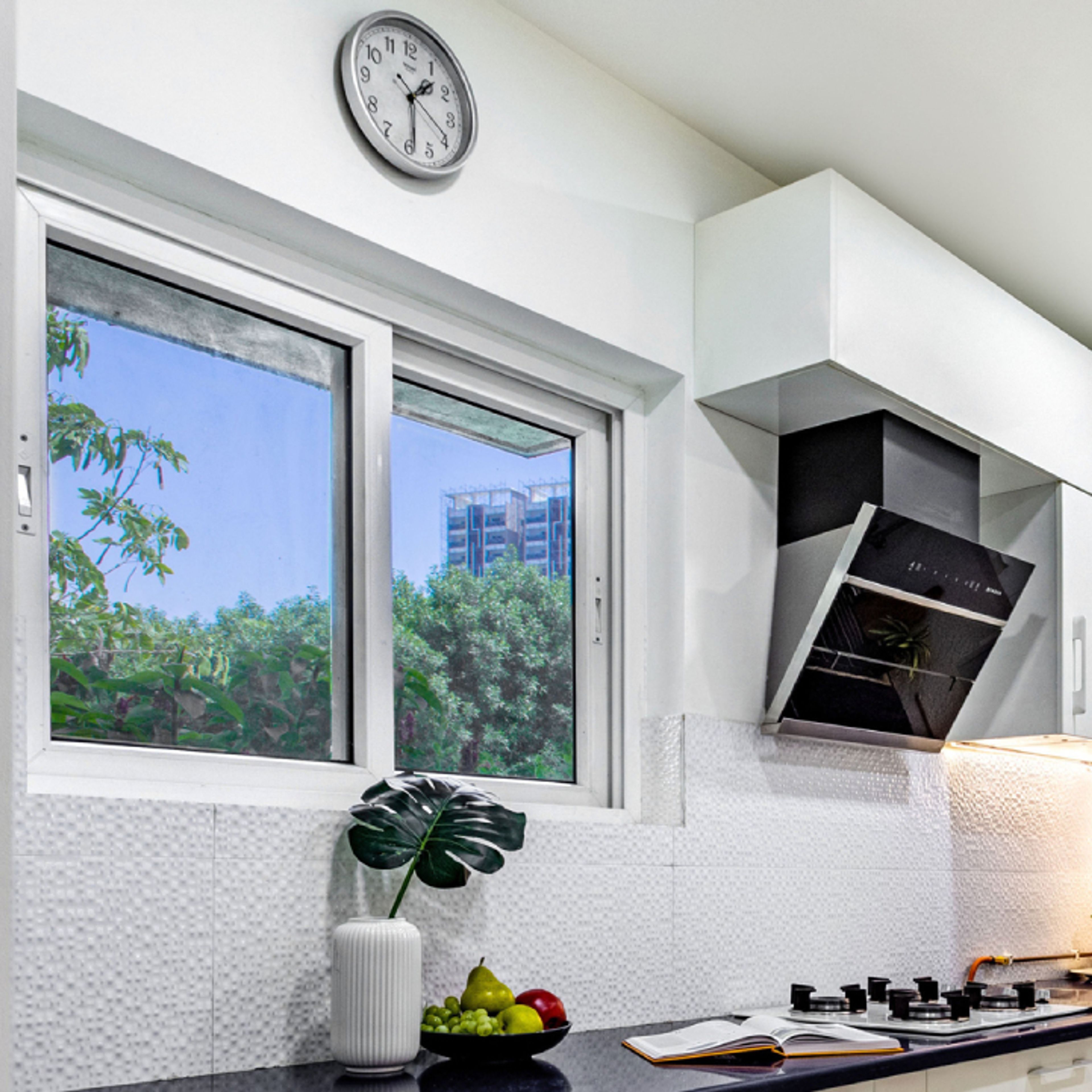 Sliding Window Design With A UPVC White Frame - Livspace