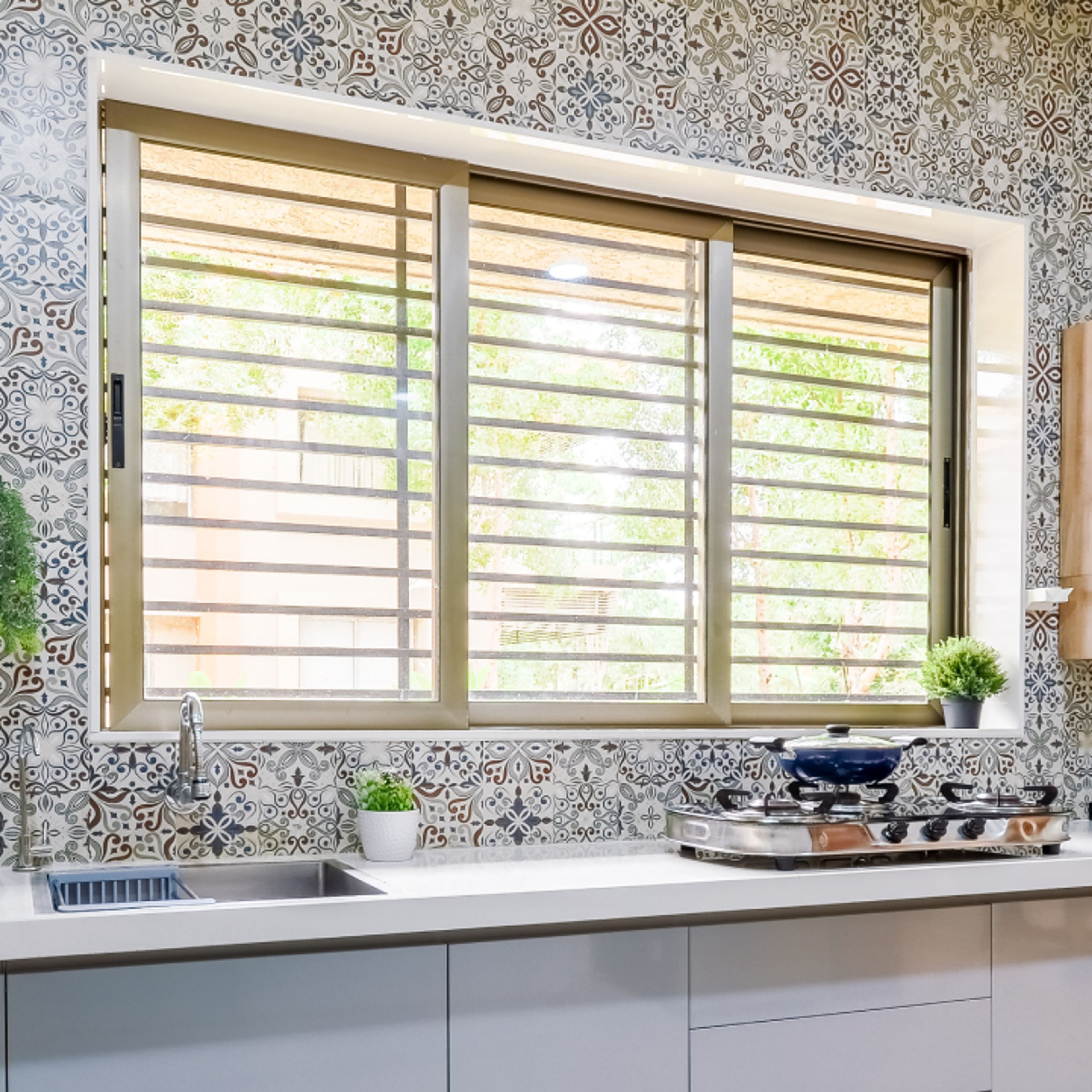 Sliding Glass Window Design With With A Golden UPVC Frame - Livspace