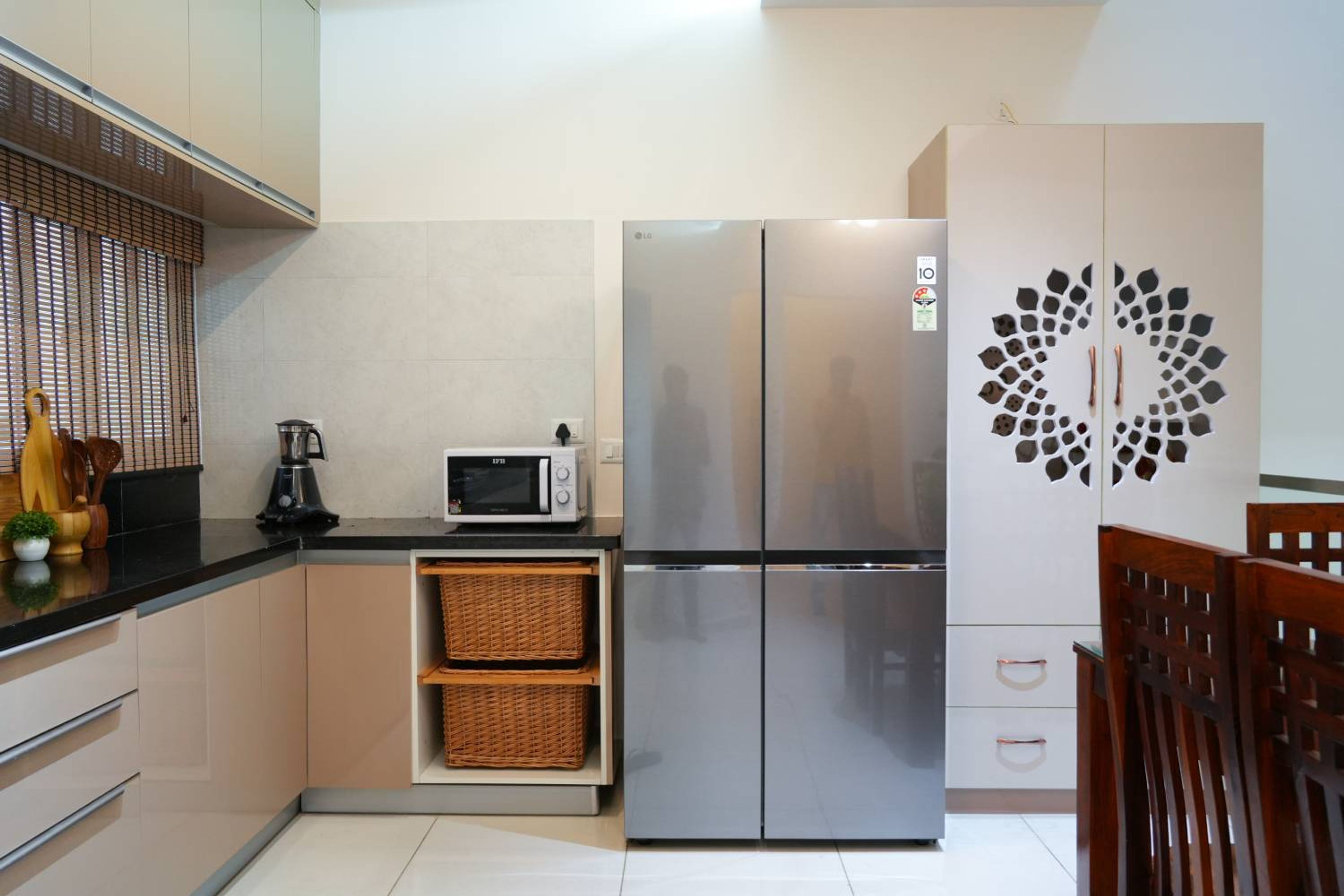 L-Shaped Kitchen Design with Refrigerator and Wicker Basket