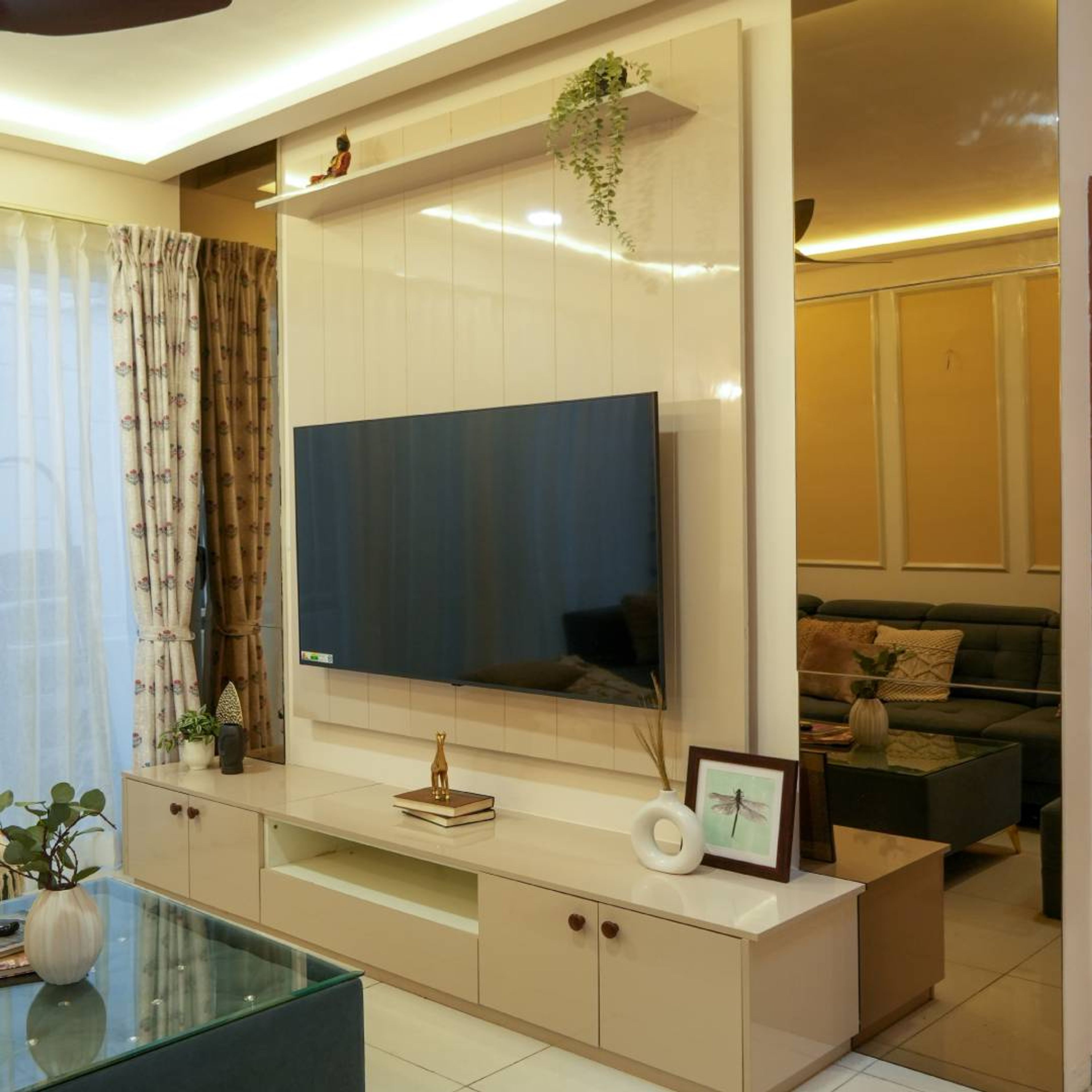 Living Room Design with Cream Glossy Backsplash and Drawers