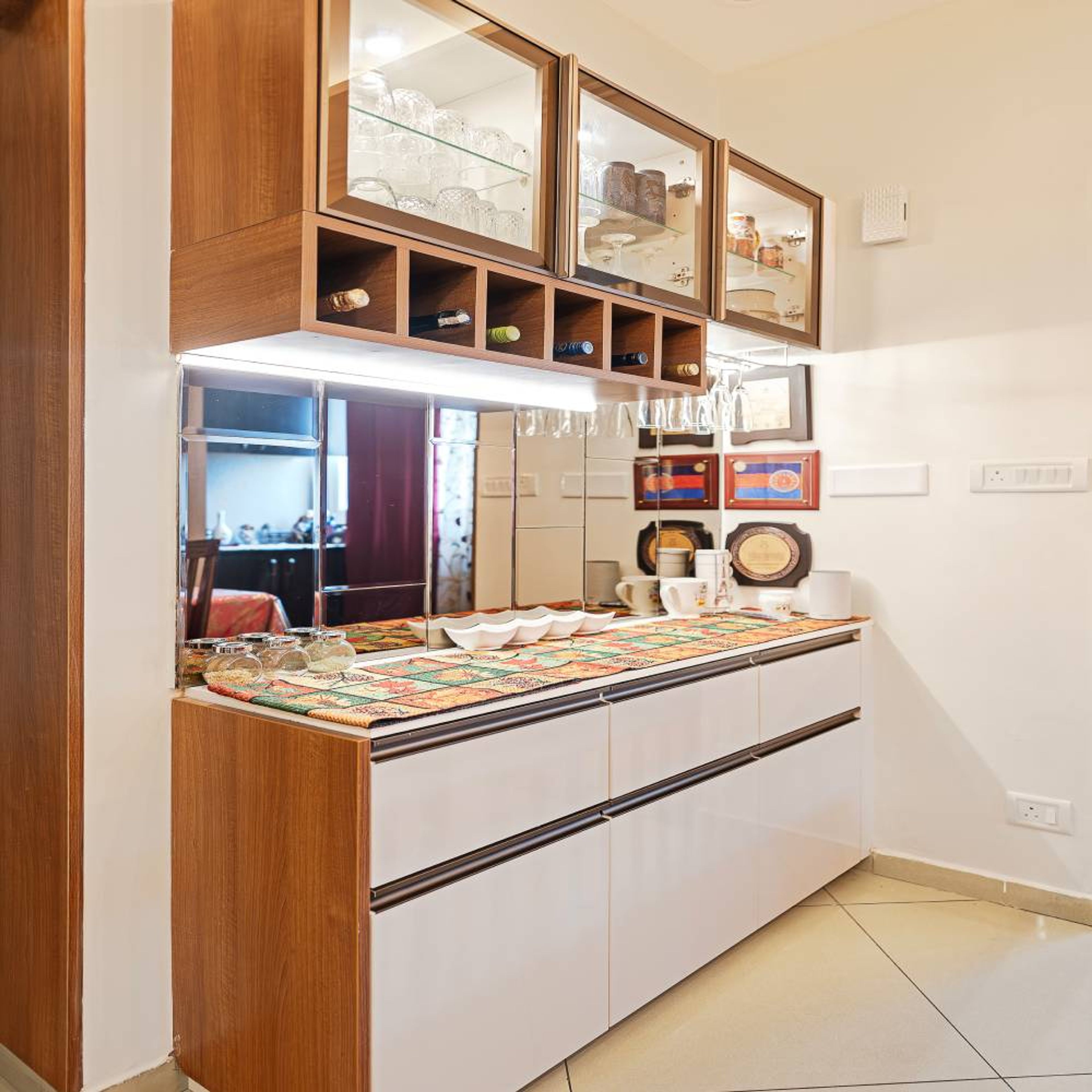 Modern Crockery Design with Glass Cabinets and Open Cubbies