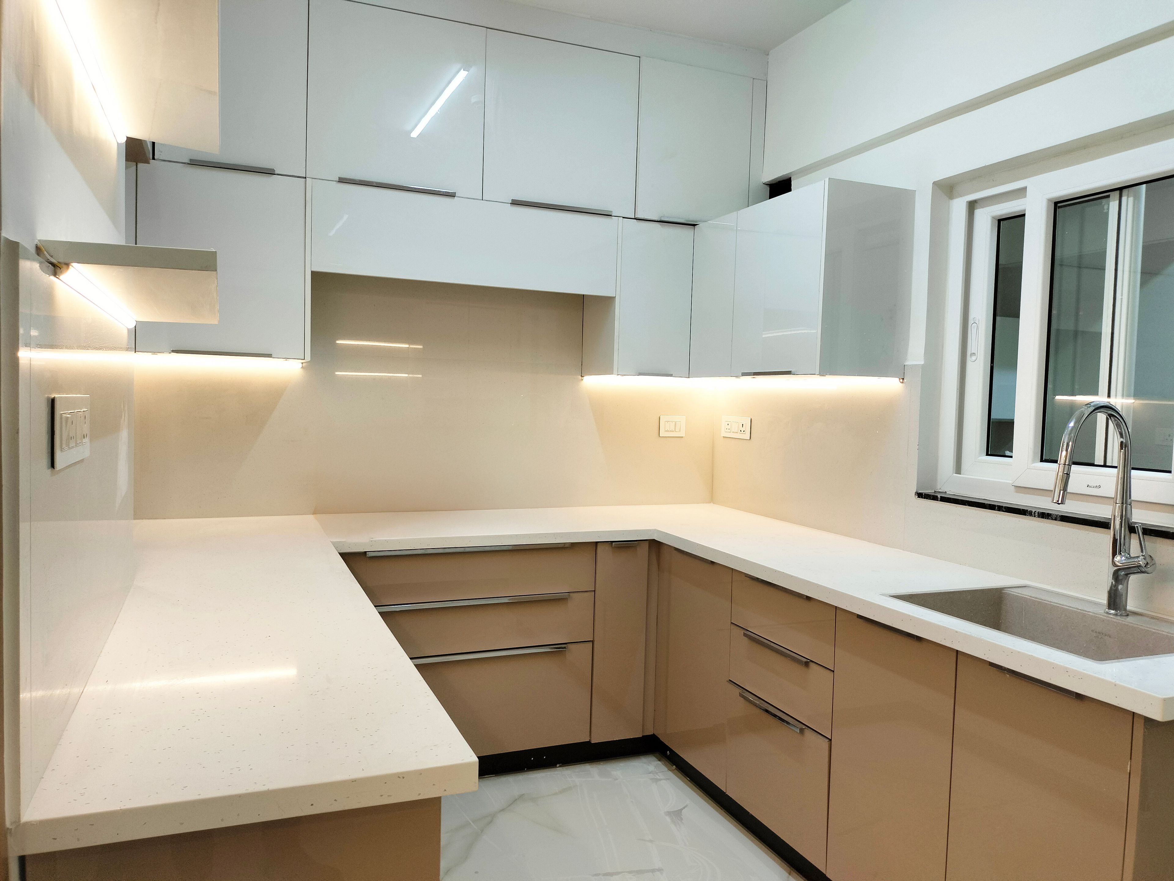U Shaped Kitchen Design with Two-Tone Cabinetry and Marble Countertop