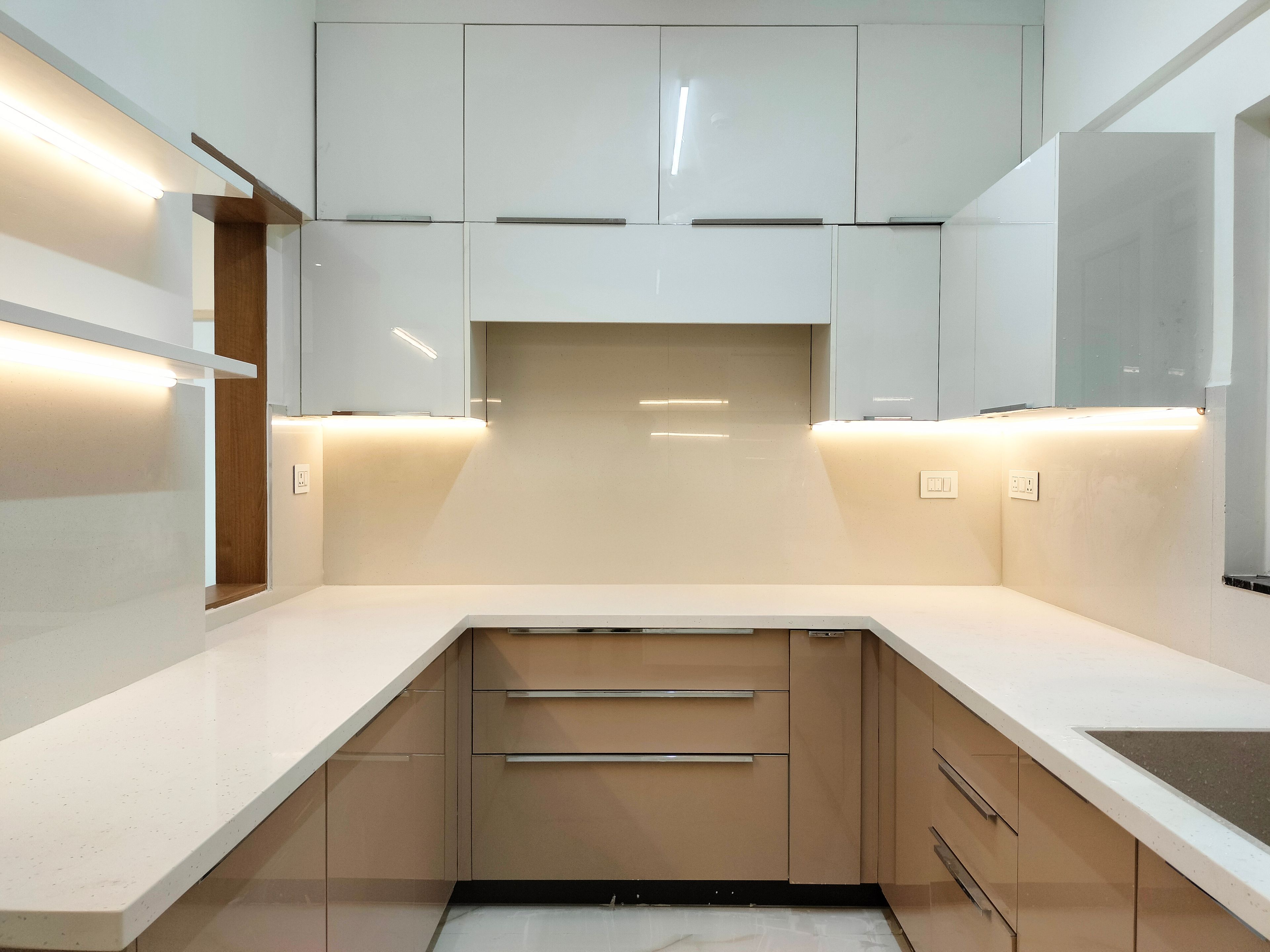Modern U Shaped Kitchen Design with Two-Tone Cabinetry and Marble Countertop