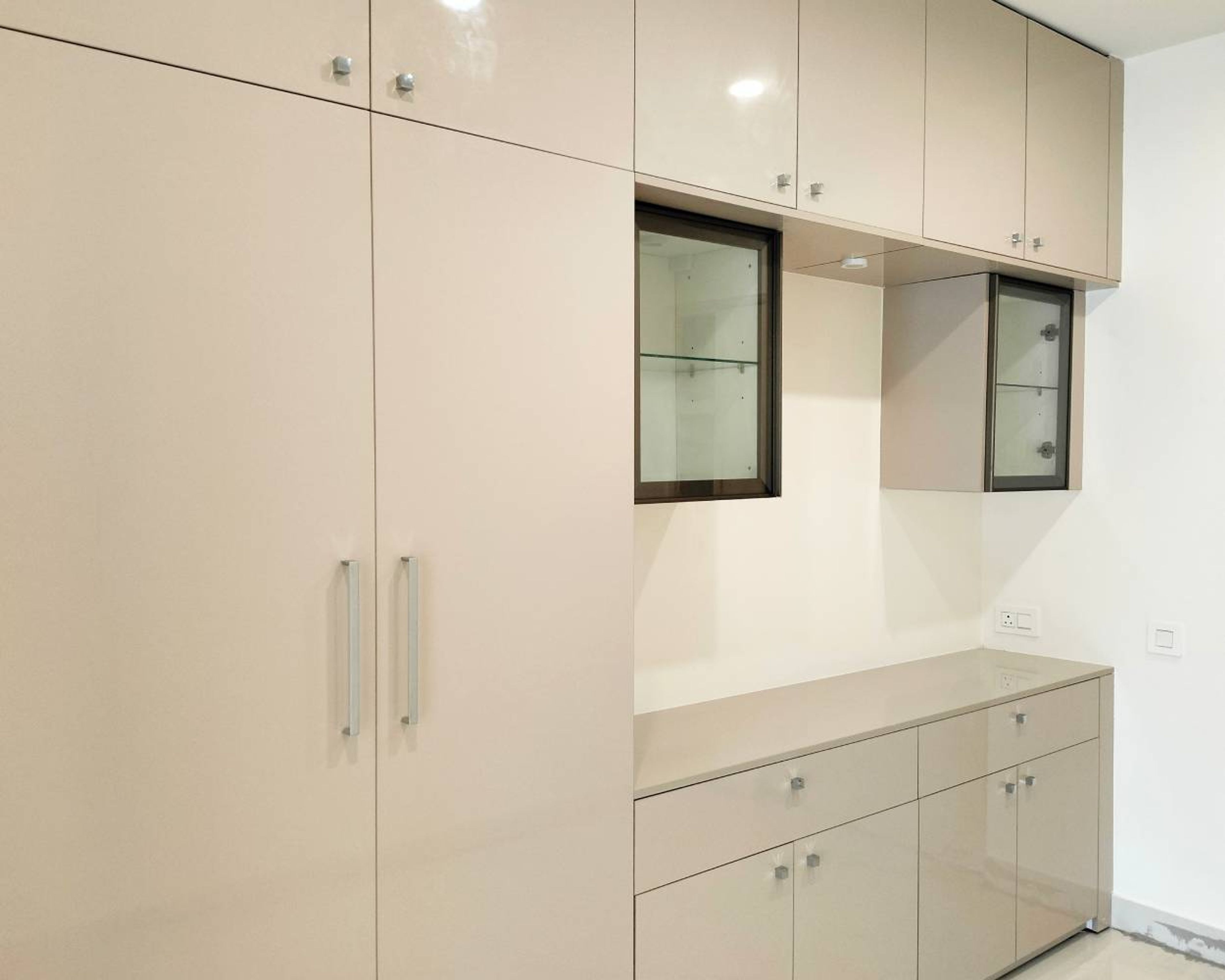 2-Door Beige Swing Wardrobe Design with Attached Wall and Base Unit Storage