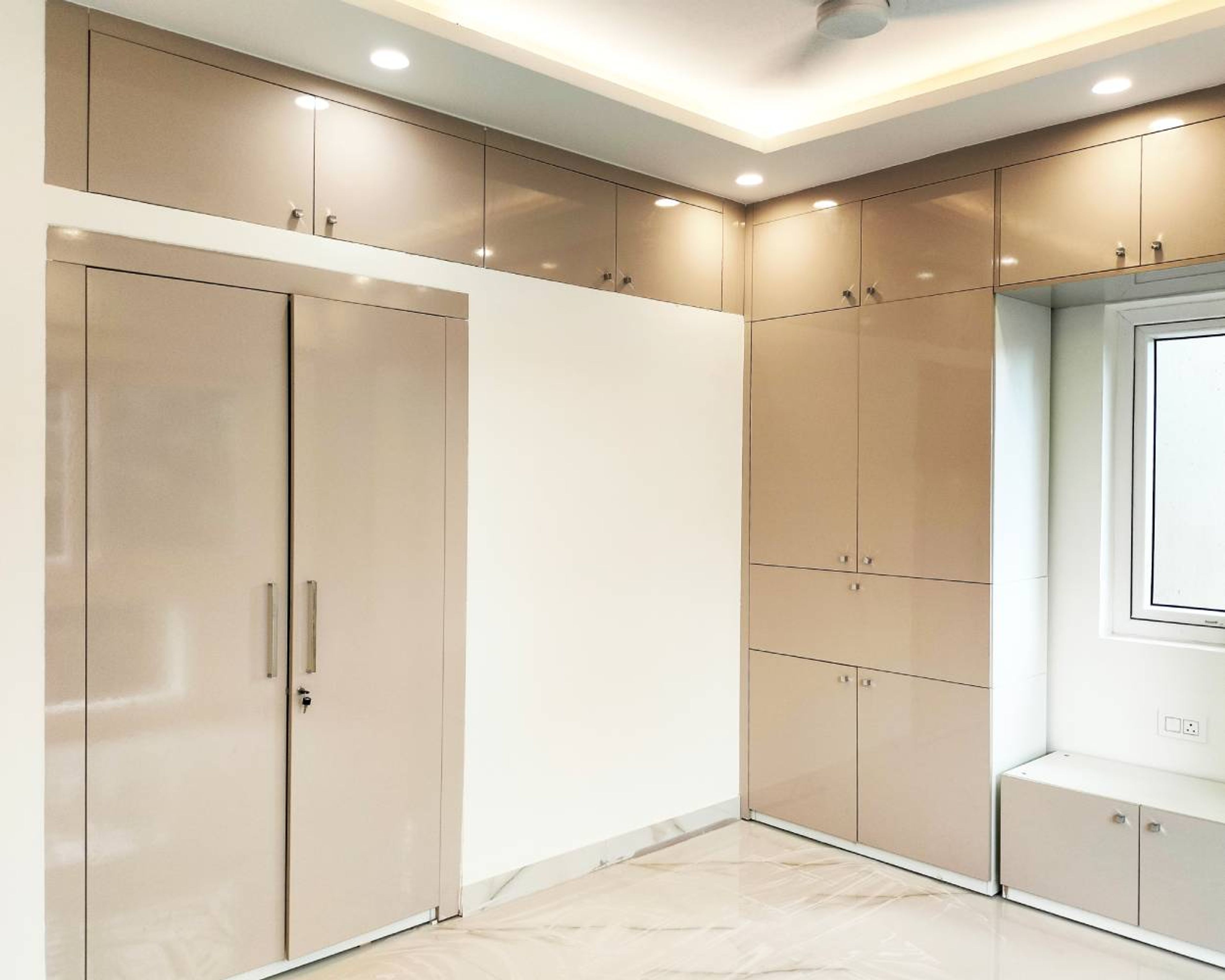 4 Door Wardrobe Design in Cream Colour and Suede Finish