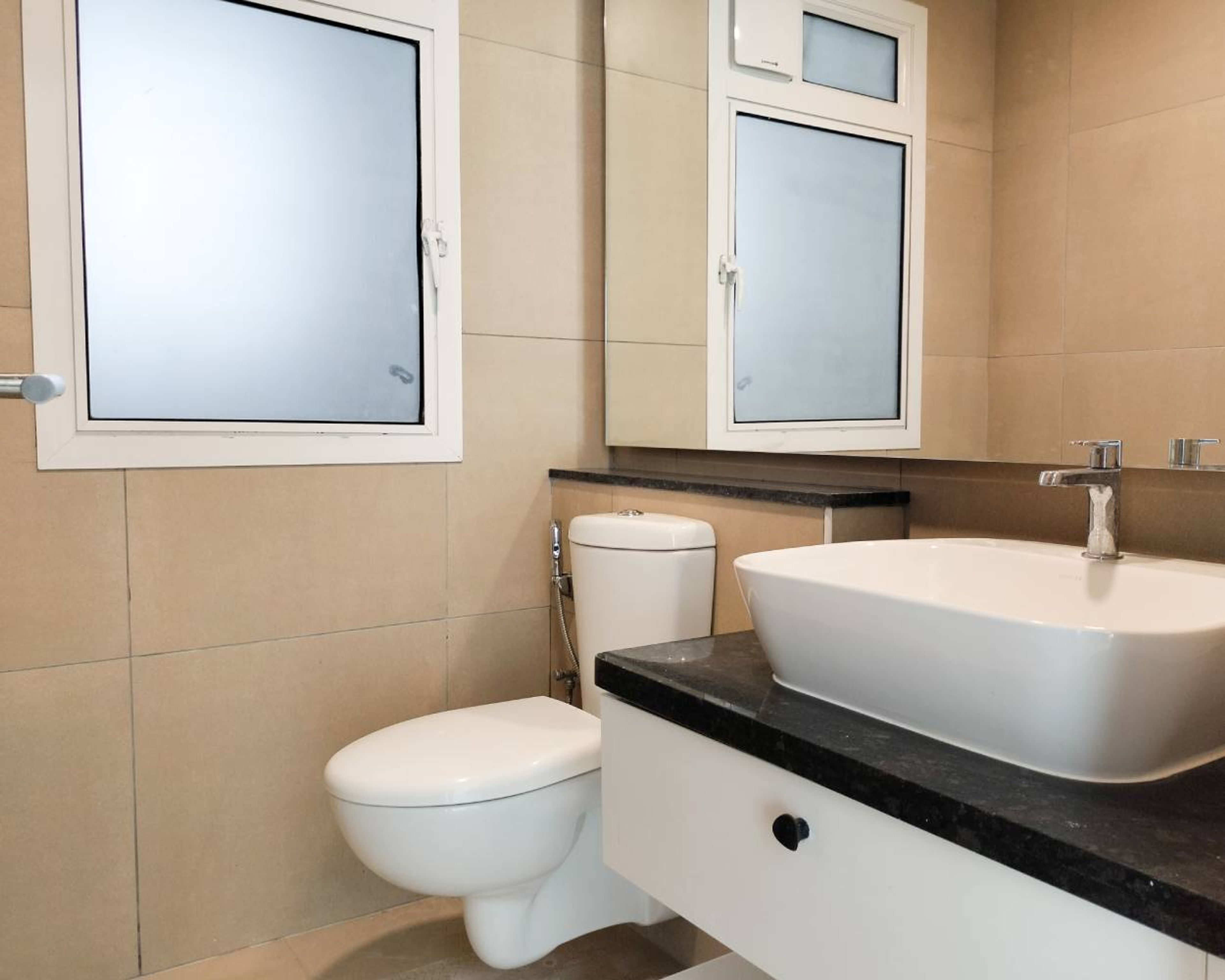 Contemporary Bathroom Design with Vessel Sink and Large Mirror