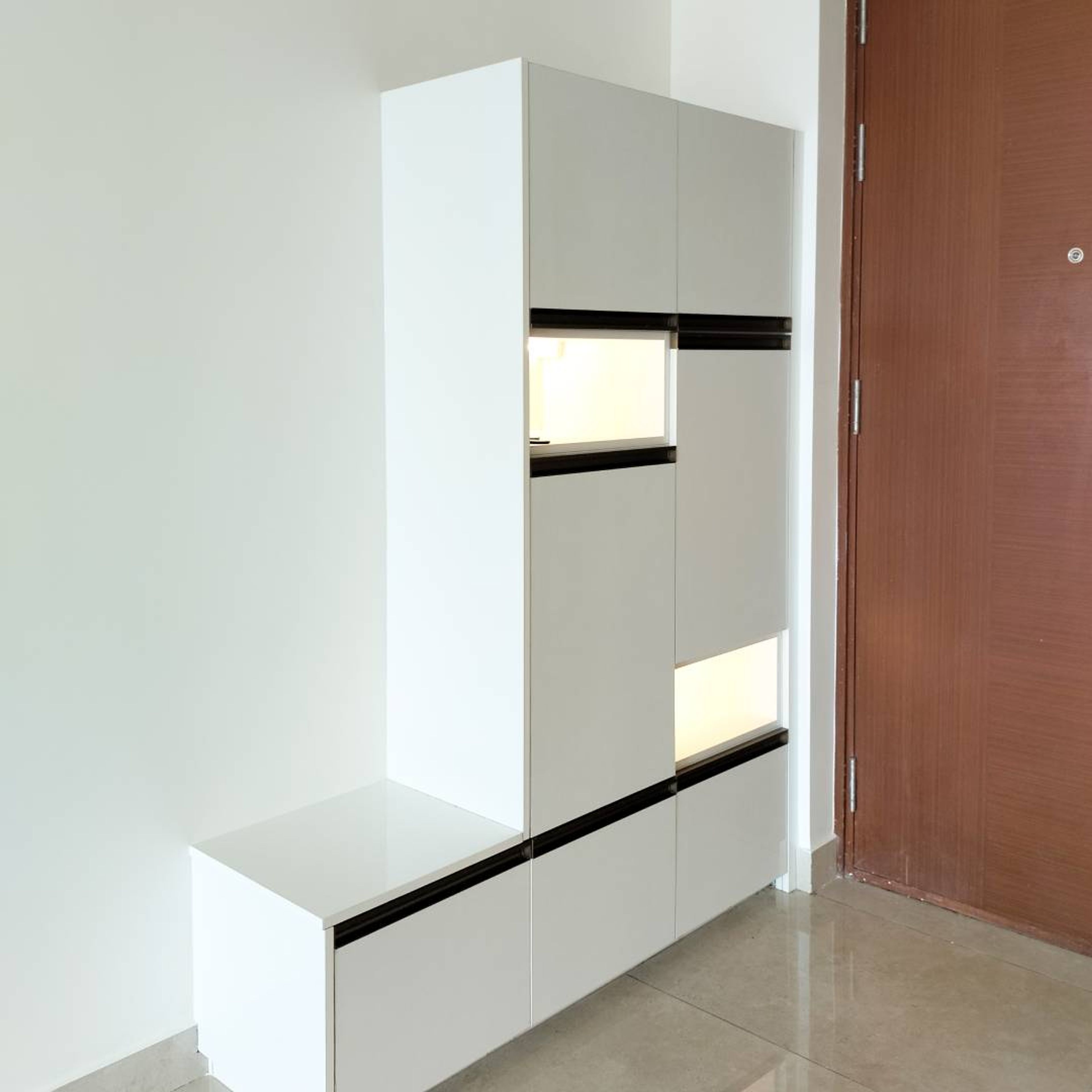 White Storage Unit with L-Shaped Seating Space