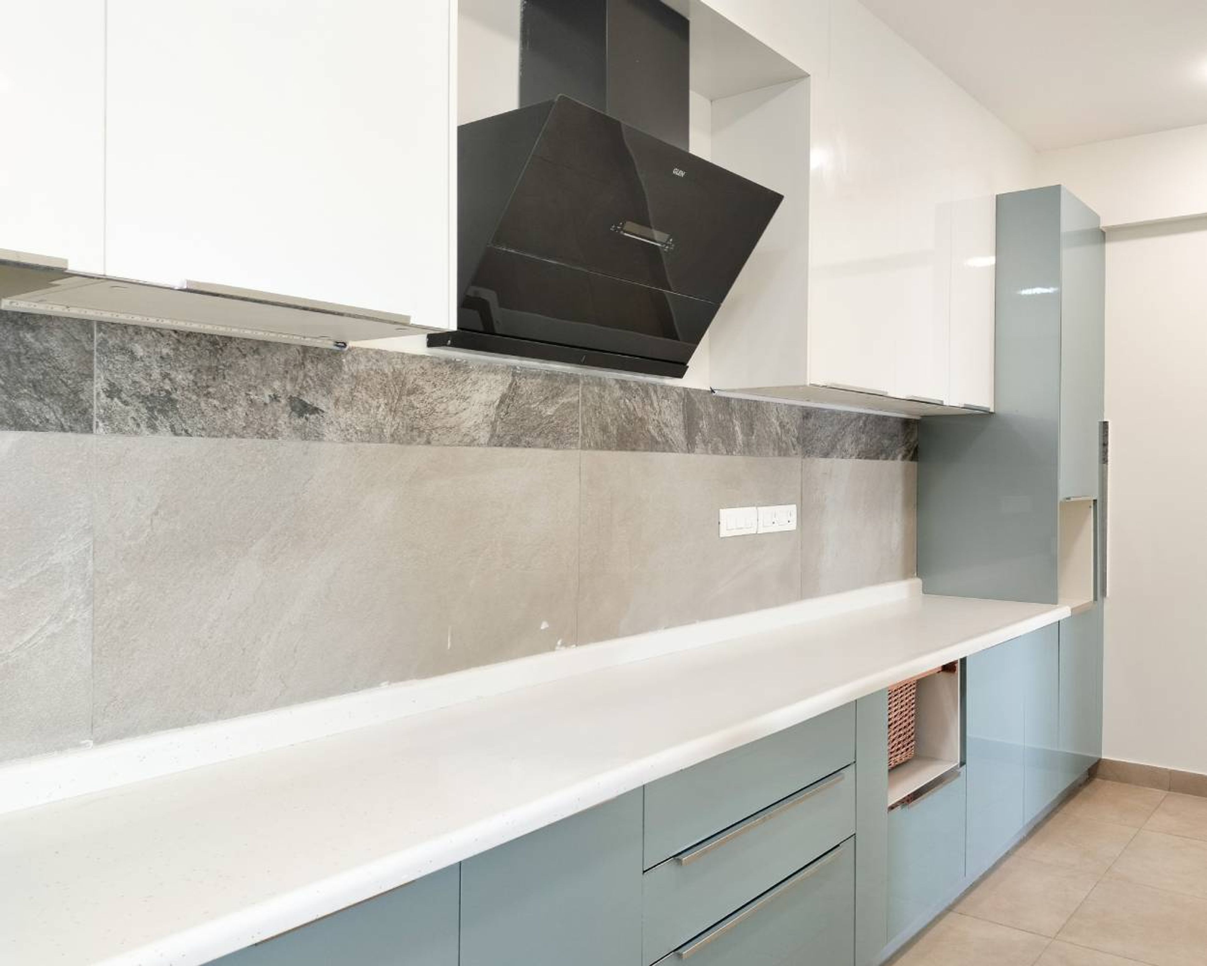 Parallel Kitchen Deign with White Quartz Countertop and Grey Backsplash