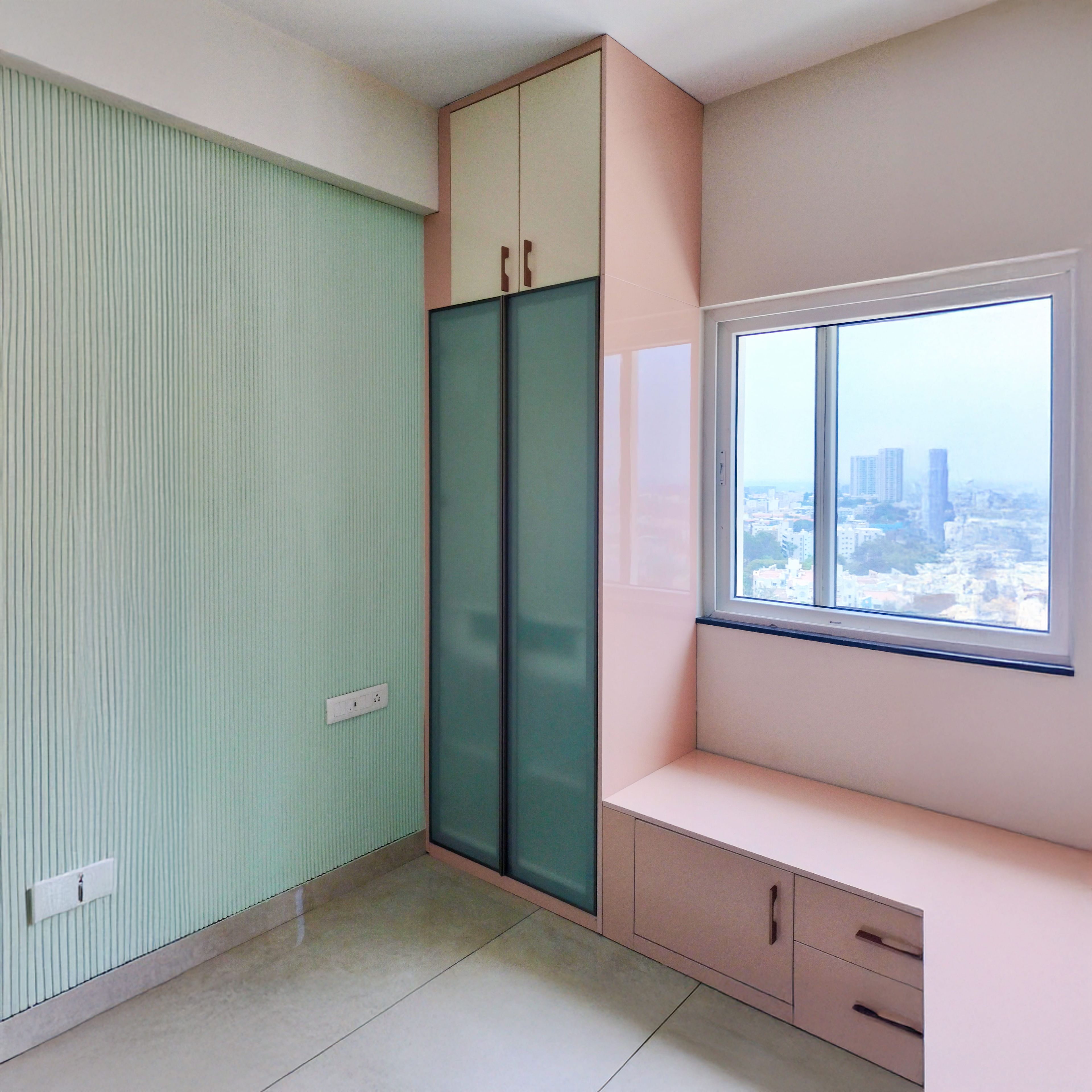 2-Door Green Tinted Glass Shutter Sliding Wardrobe with Pink Storage Seating