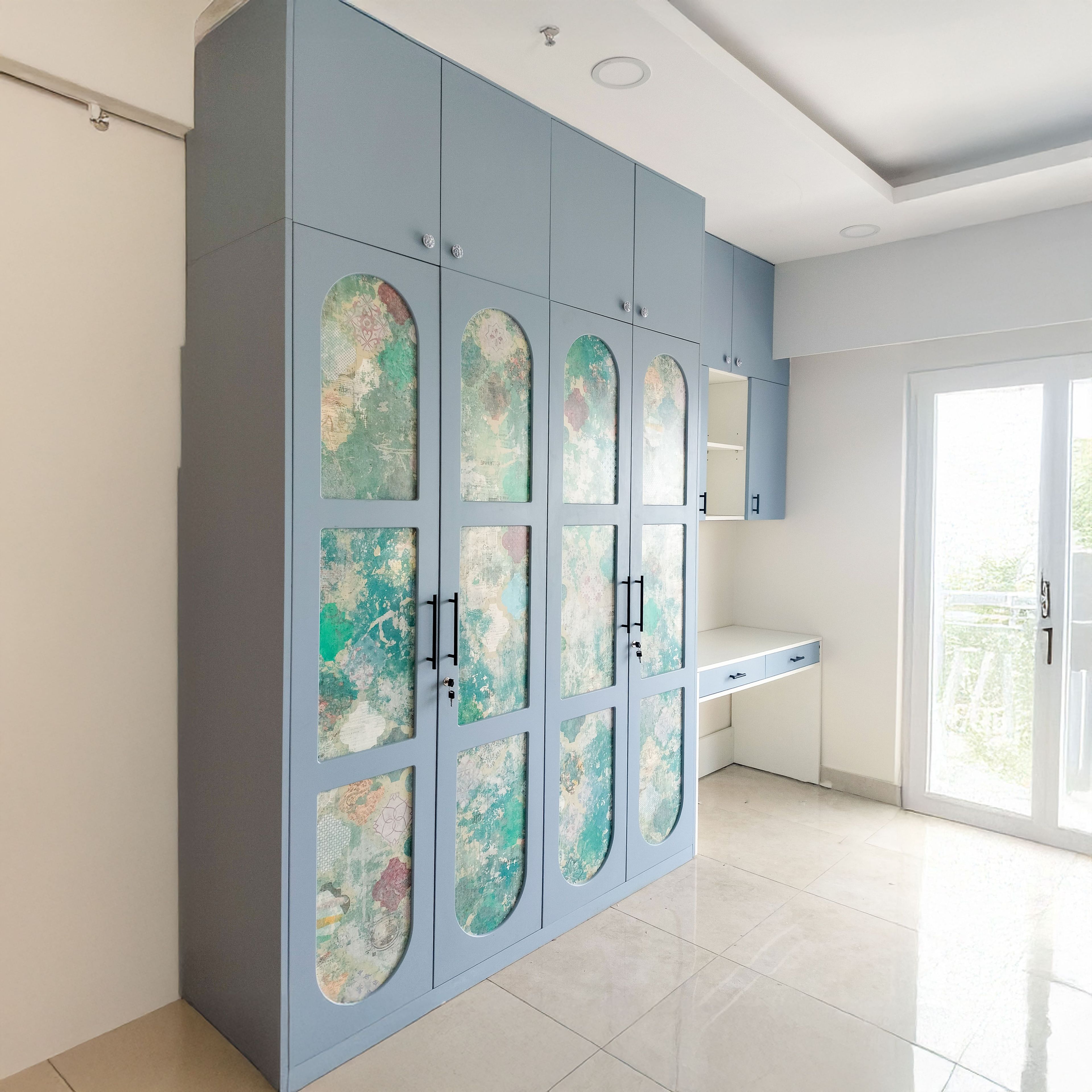 4-Door Arched Floral Panel Blue Swing Wardrobe Design and Loft Unit