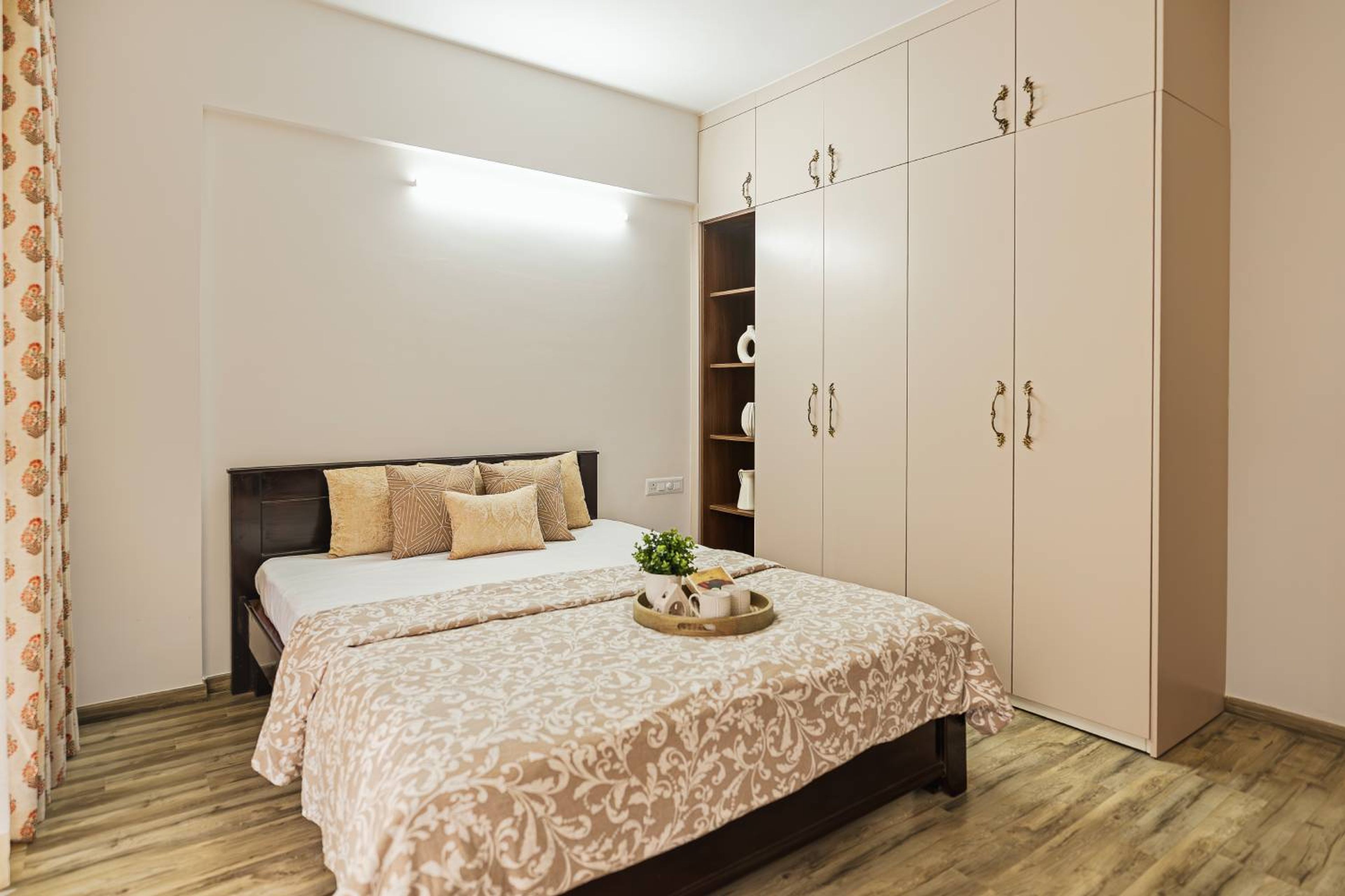 Master Bedroom Design with Full-Height Wardrobe and Hydraulic Storage Bed