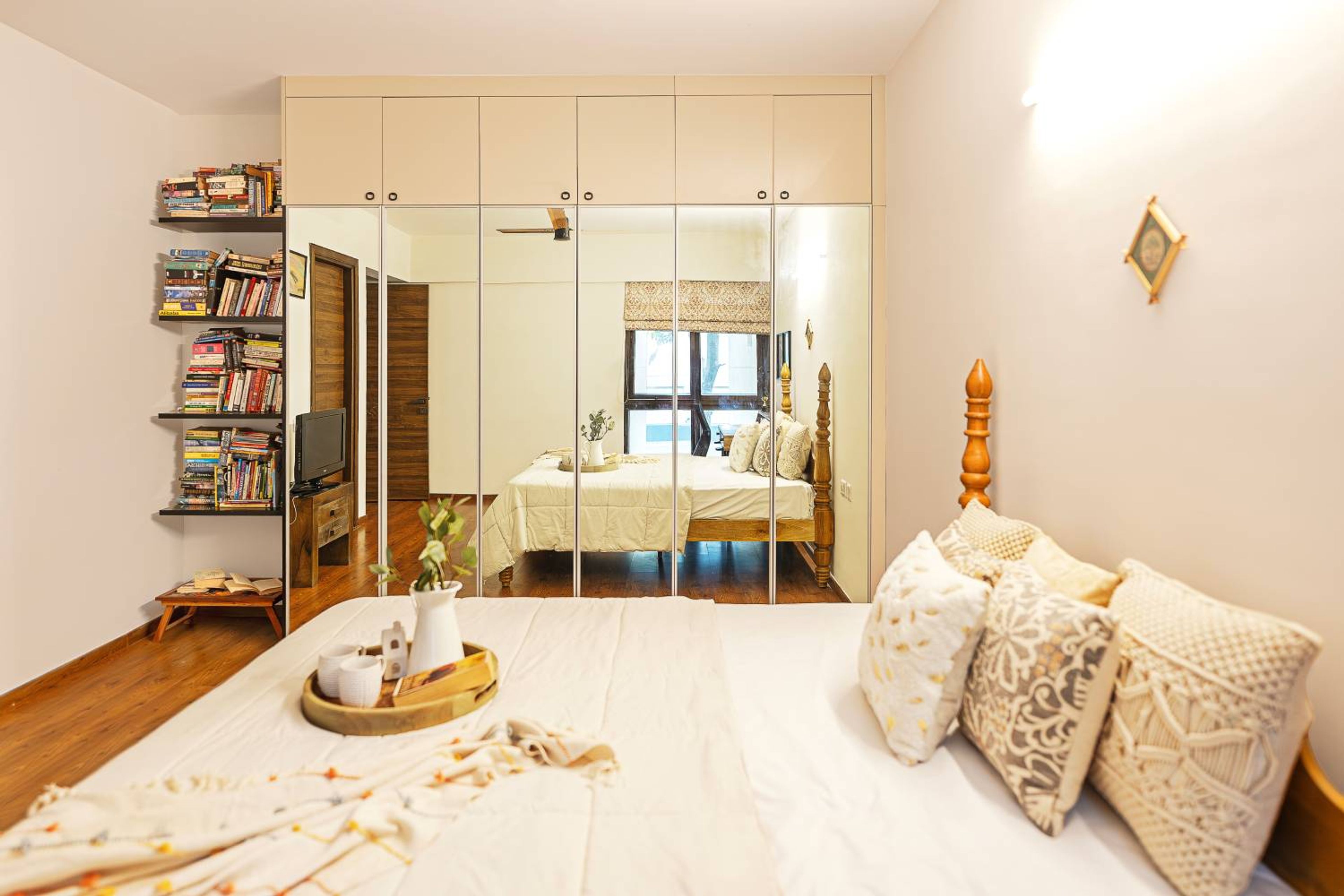 Mirrored White 6-Door Modern Swing Wardrobe Design with Bookshelf and Side Shelving