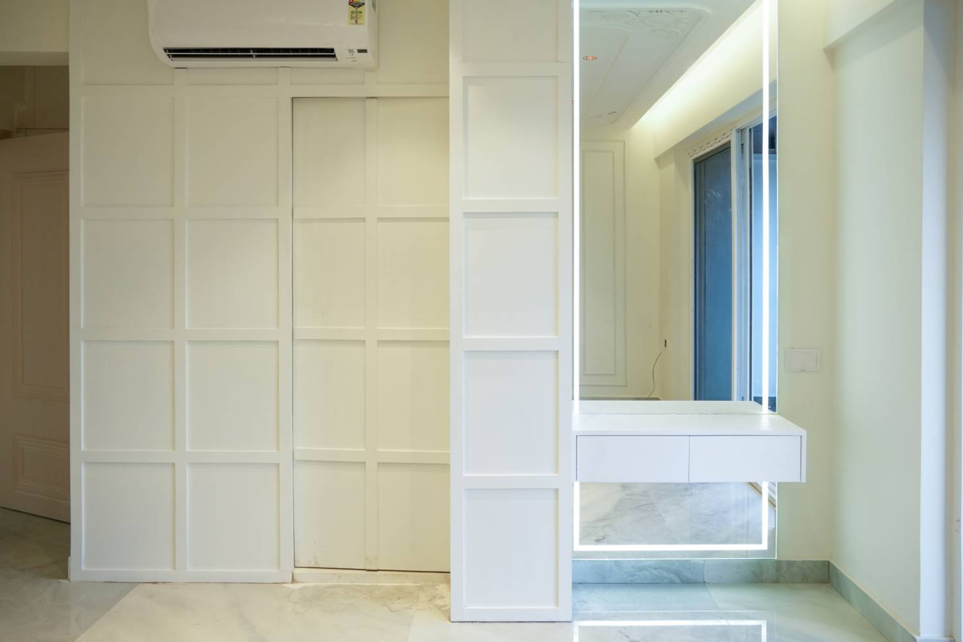 Grid Pattern Paneled Wall Design With Floating Vanity And Illuminated Rectangular Mirror
