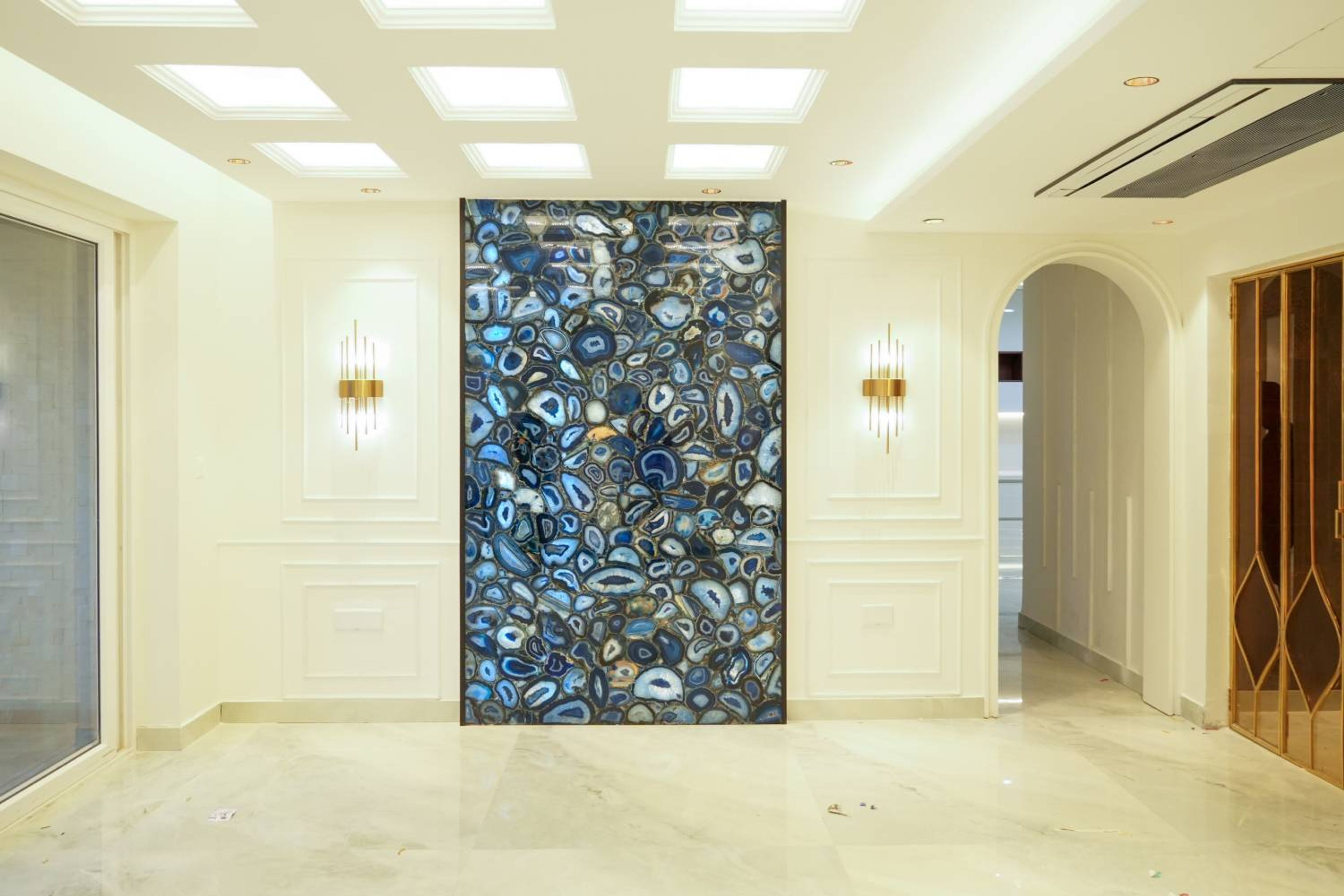 Living Room Design with Grey L-Shaped Sofa, Pink Curtains and Wooden Nesting Table