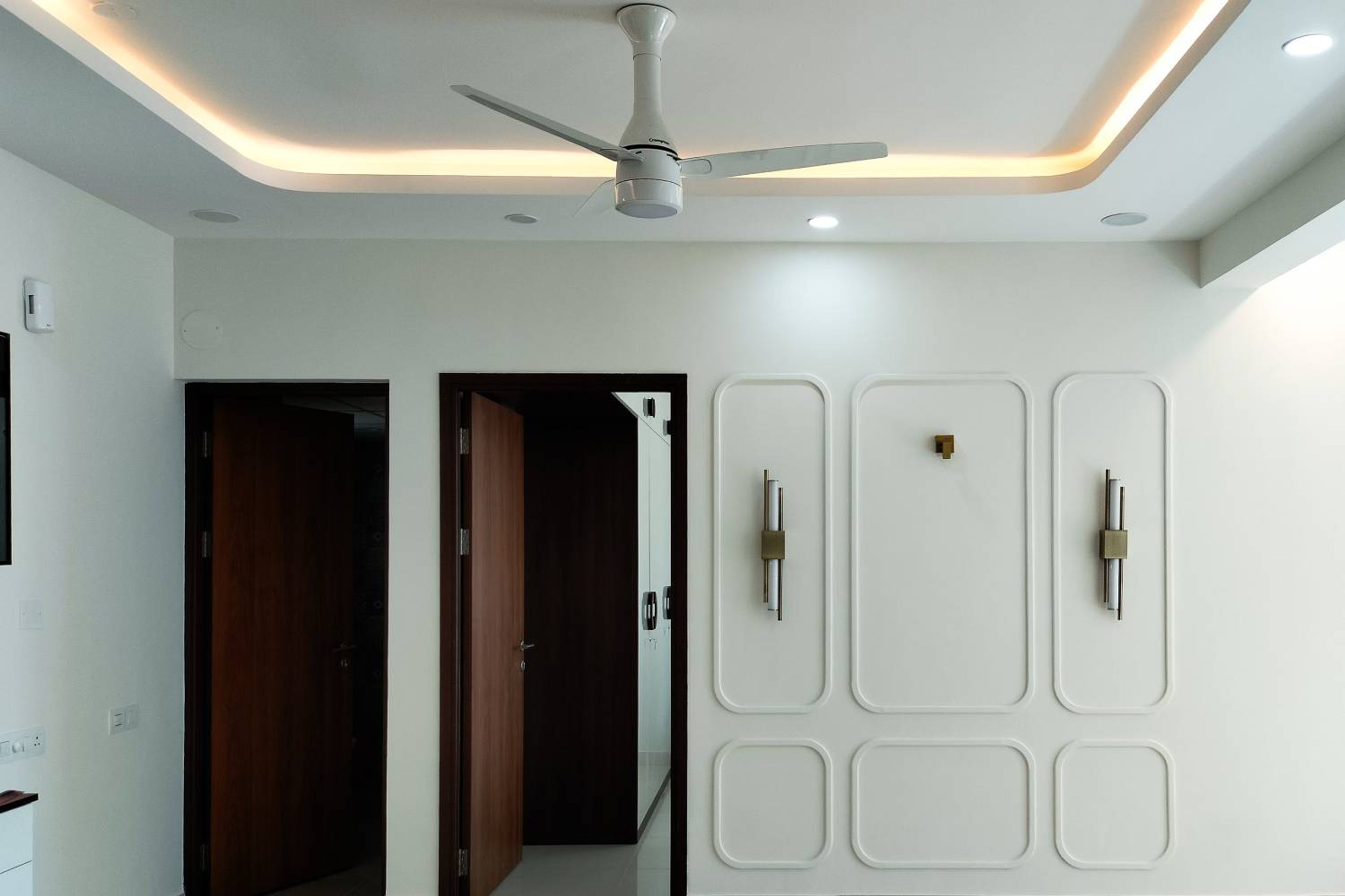 Modern False Ceiling Design with Recessed Spotlights and Cove Lighting