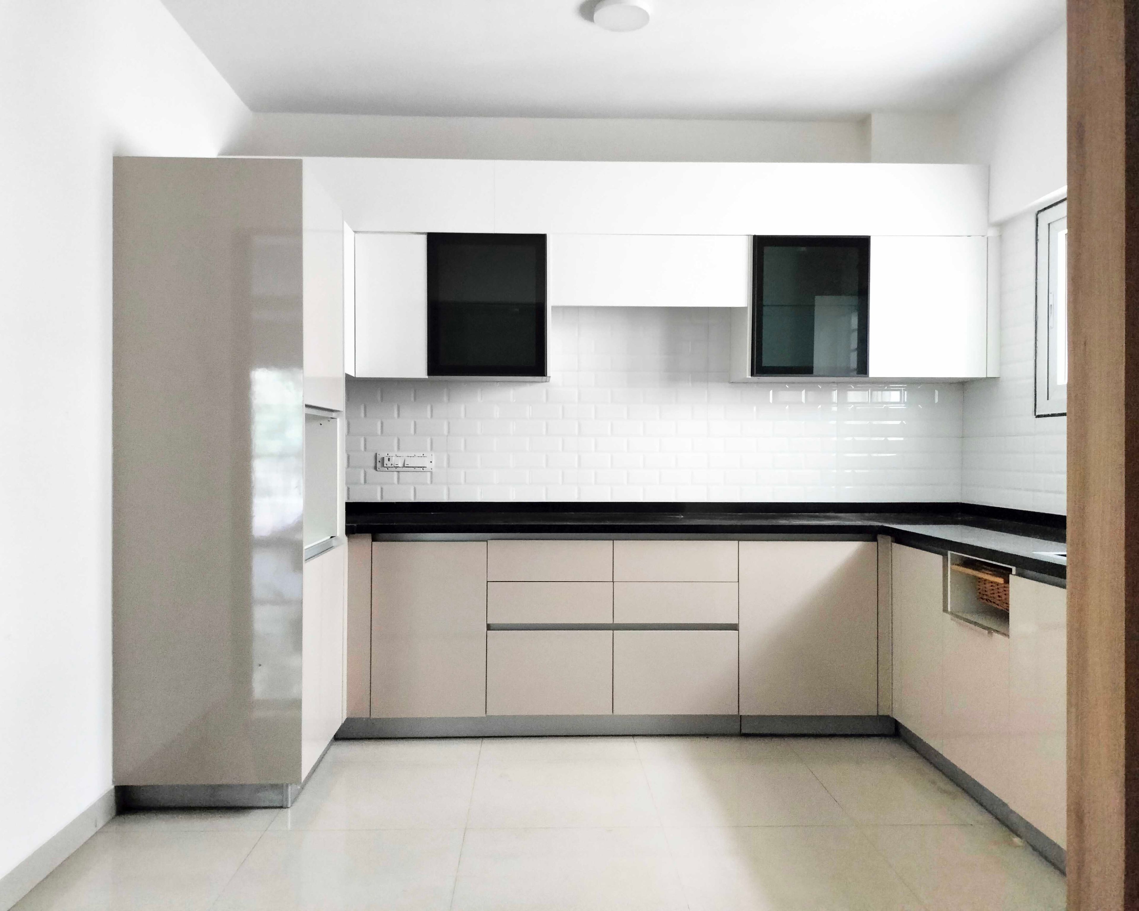 U-Shaped Kitchen Design with White and Beige Units and Granite Countertop