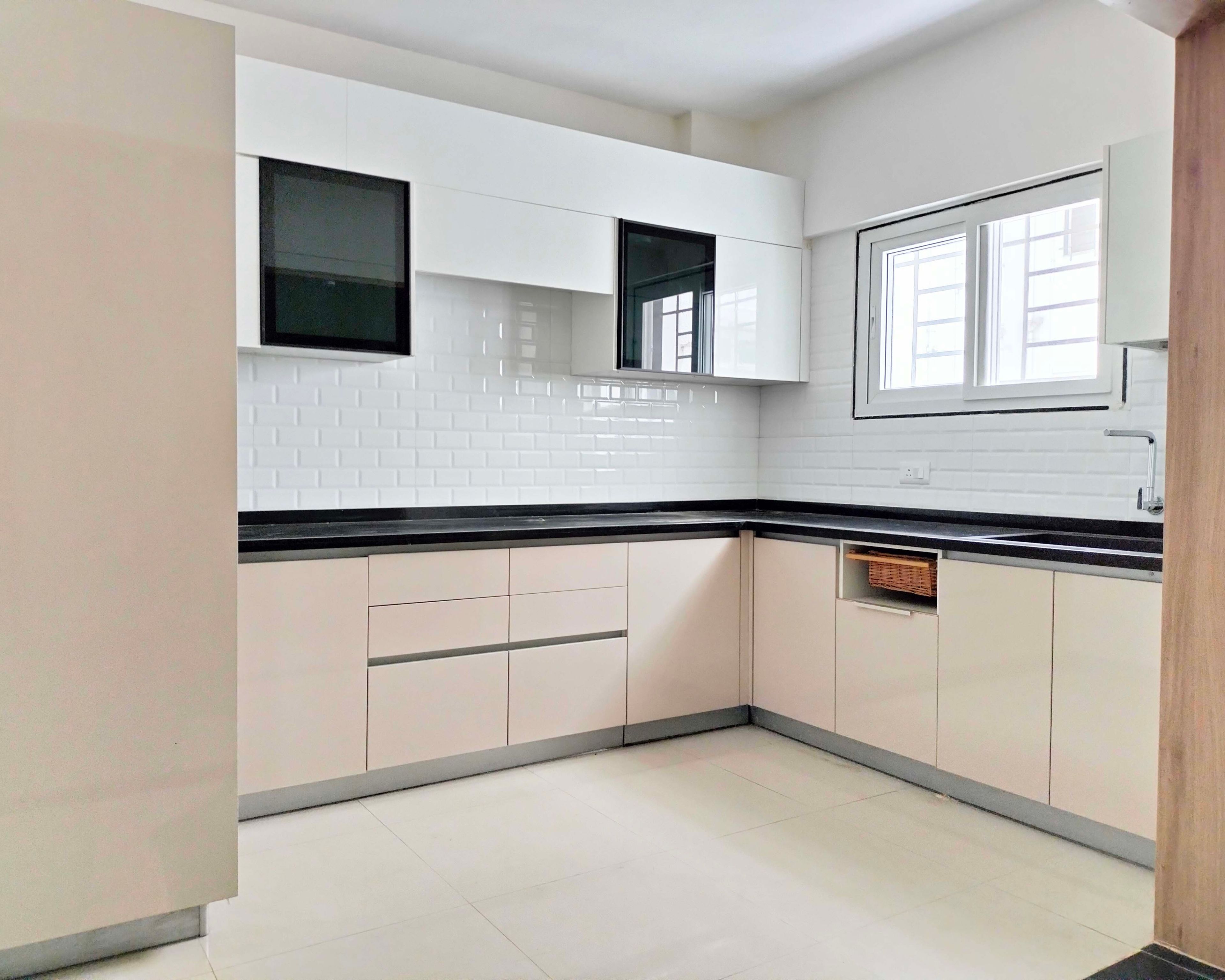 U-Shaped Kitchen Design with White and Beige Units and White Brick Patterned Tiled Backsplash